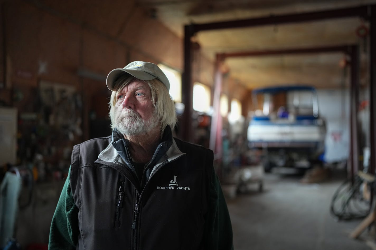 Portrait of Bill Hooper in his boatyard in Afton.