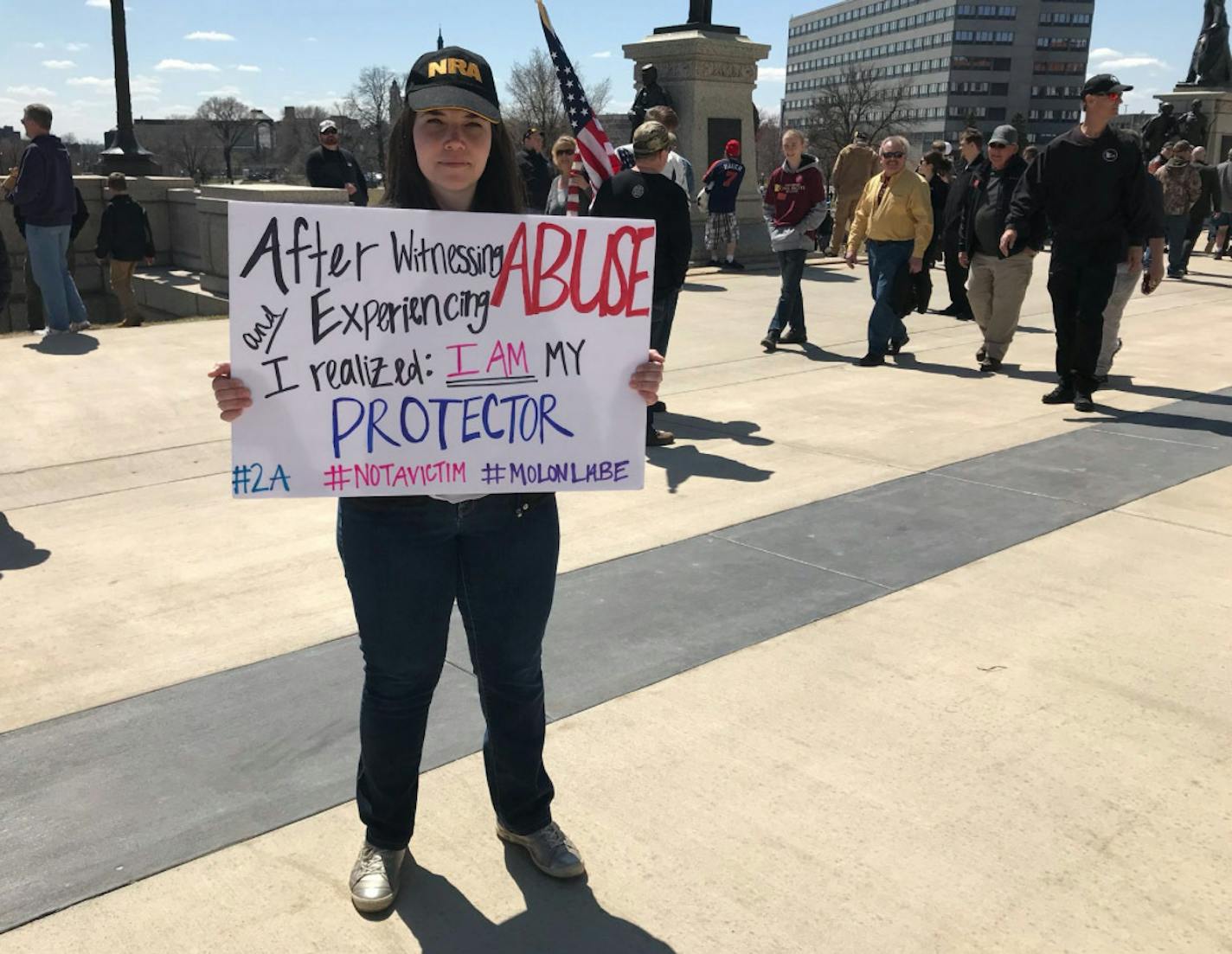 Several hundred Minnesotans attended a pro-gun rally at the capitol in St. Paul Saturday. ] Miguel Otarola Star Tribune 4/28/2018 no ID on woman holding sign.