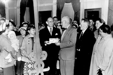 Mayor Ed Wooden, 78, presented the key to Funkley, Minn., to New York City Mayor Vincent Impellitteri during the visit to the Big Apple of Funkley res