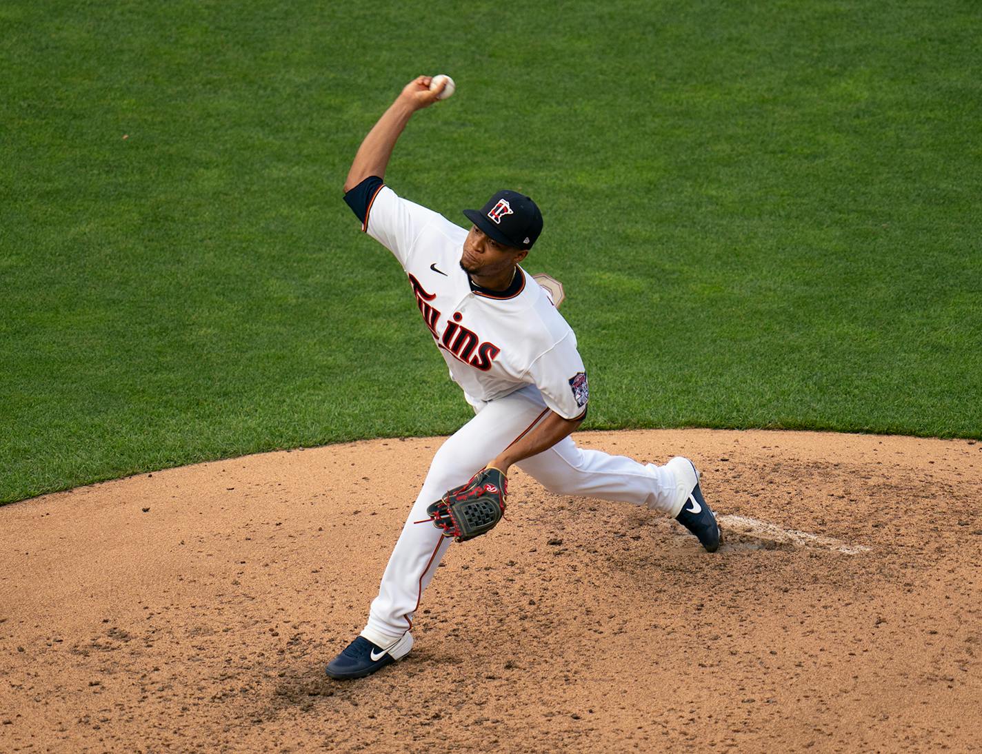 Twins relief pitcher Jorge Alacala (66) threw during live batting practice Monday evening.