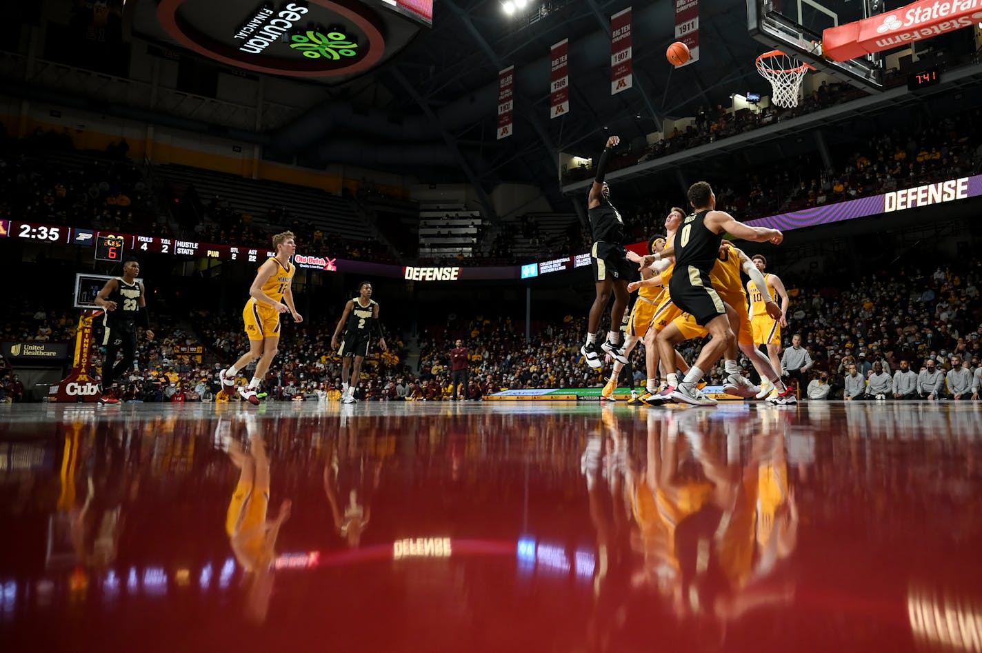 Purdue Boilermakers forward Trevion Williams (50) attempts a two-point basket during the second half of an NCAA men's basketball game between Minnesota and Purdue at Williams Arena in Minneapolis, Minn.