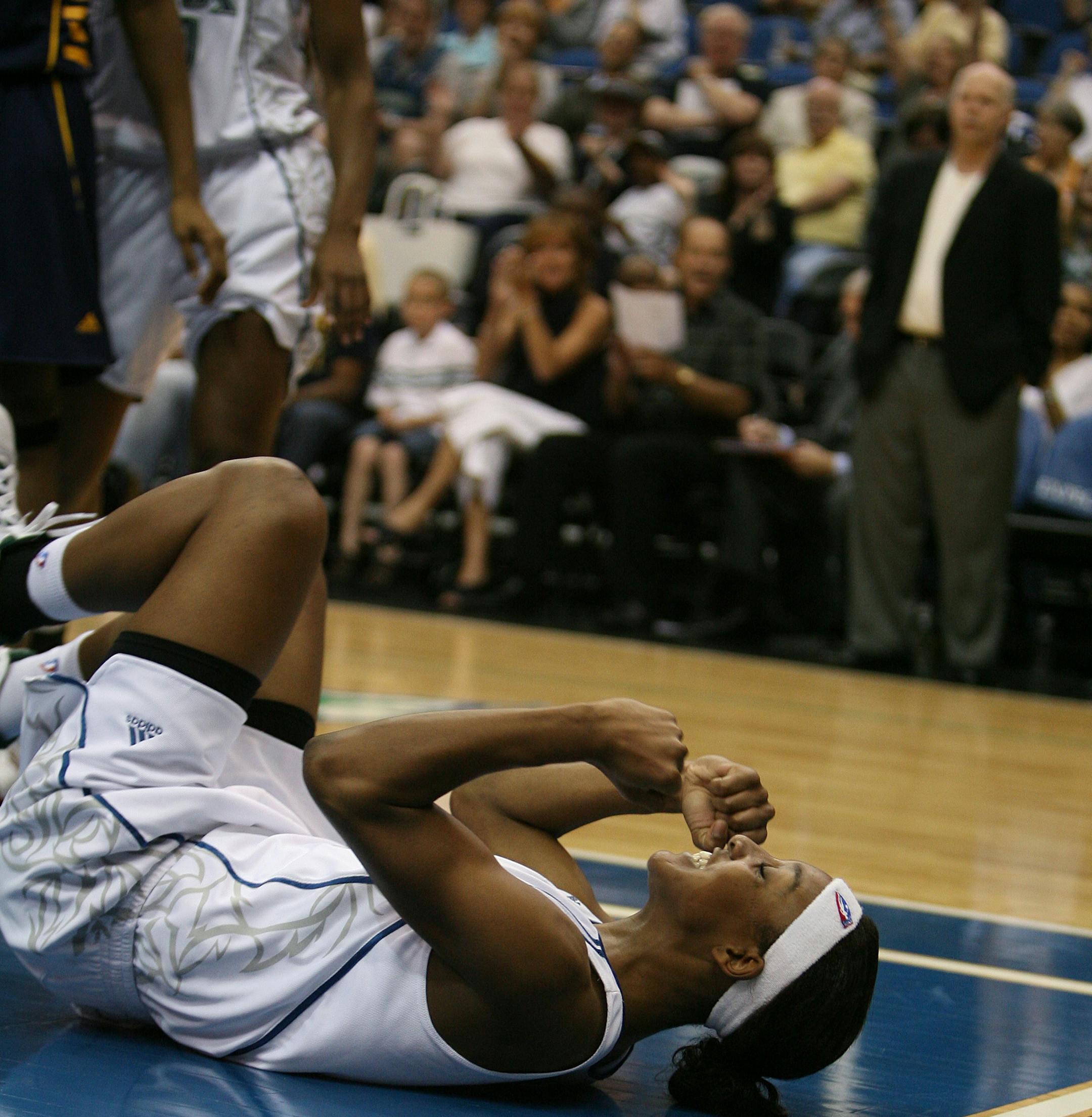Lynx rookie Candice Wiggins celebrated after scoring two of her game-high 22 points on a layup and getting fouled.