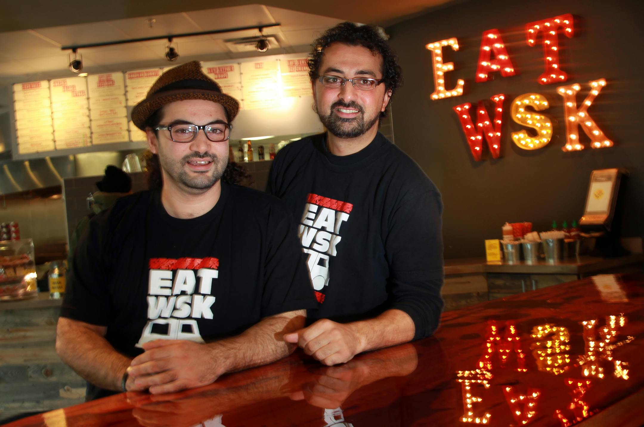The World Street Kitchen, Chef Sameh Wadi and his co-owner brother Saed Wadi. __ Restaurant review of the World Street Kitchen, Chef Sameh Wadi and his co-owner brother Saed Wadi. in the main area of their Lyndale Restaurant that serves great food as if you would get it from a gourmet food truck. The Food: potato-lentil patty, short rib yum-yum bowl, MFC sandwich, meatball lettuce wrap, squash taco, salted caramel sundae.  [ TOM WALLACE • twallace@startribune.com _ Assignments #20027