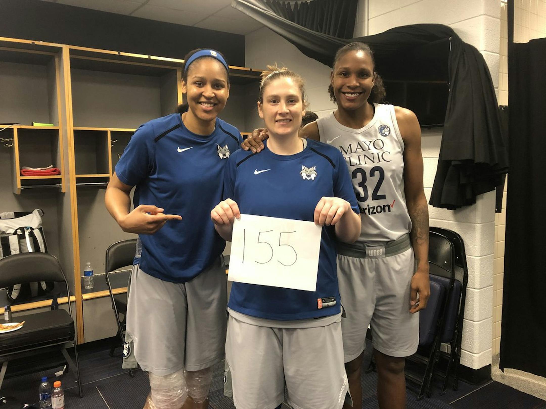 The Lynx trio of, from left, Maya Moore, Lindsay Whalen and Rebekkah Brunson posed in the locker room at Capital One Arena on Thursday after an 88-80 victory over the Washington Mystics. With 155 victories together, they passed Tamecka Dixon, Lisa Leslie and Mwadi Mabika (Los Angeles Sparks, 1997-2005) for the most victories in WNBA history as a trio of teammates. (Lynx PR)