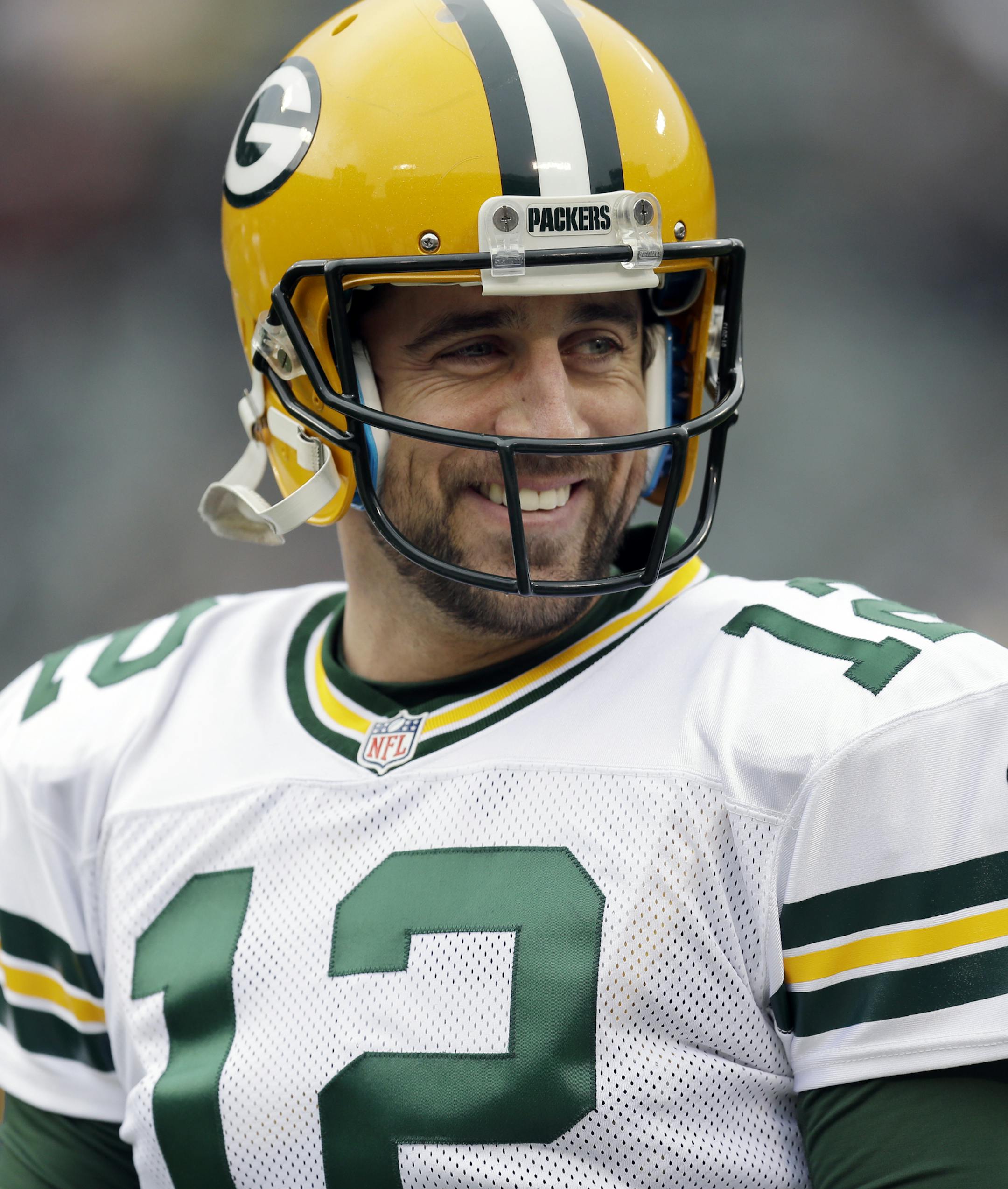 Green Bay Packers quarterback Aaron Rodgers warms up before an NFL football game against the Oakland Raiders Sunday, Dec. 20, 2015, in Oakland, Calif. (AP Photo/Ben Margot) ORG XMIT: OAS215