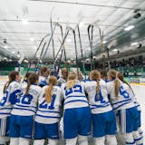 The Minnetonka girl's hockey team huddles up before taking on Holy Family in the Class 2A Section 2 girl's hockey championship.