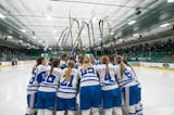 The Minnetonka girl's hockey team huddles up before taking on Holy Family in the Class 2A Section 2 girl's hockey championship.