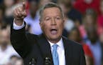 Ohio Gov. John Kasich announces he is running for the 2016 Republican party&#x2019;s nomination for president during a campaign rally at Ohio State Un