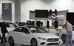 As the Twin Cities Auto Show was preparing for it's opening Friday, crews were busy building displays and polishing up the cars that will be on displa