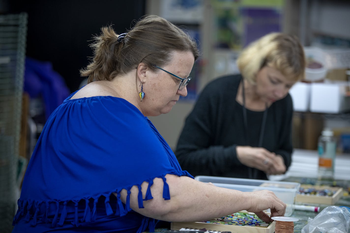 Martha Bird, an Avivo art participant since 2016, worked on her piece of art during a mosaic making art class at Avivo, Wednesday, September 25, 2019 in Minneapolis, MN. ] ELIZABETH FLORES &#x2022; liz.flores@startribune.com