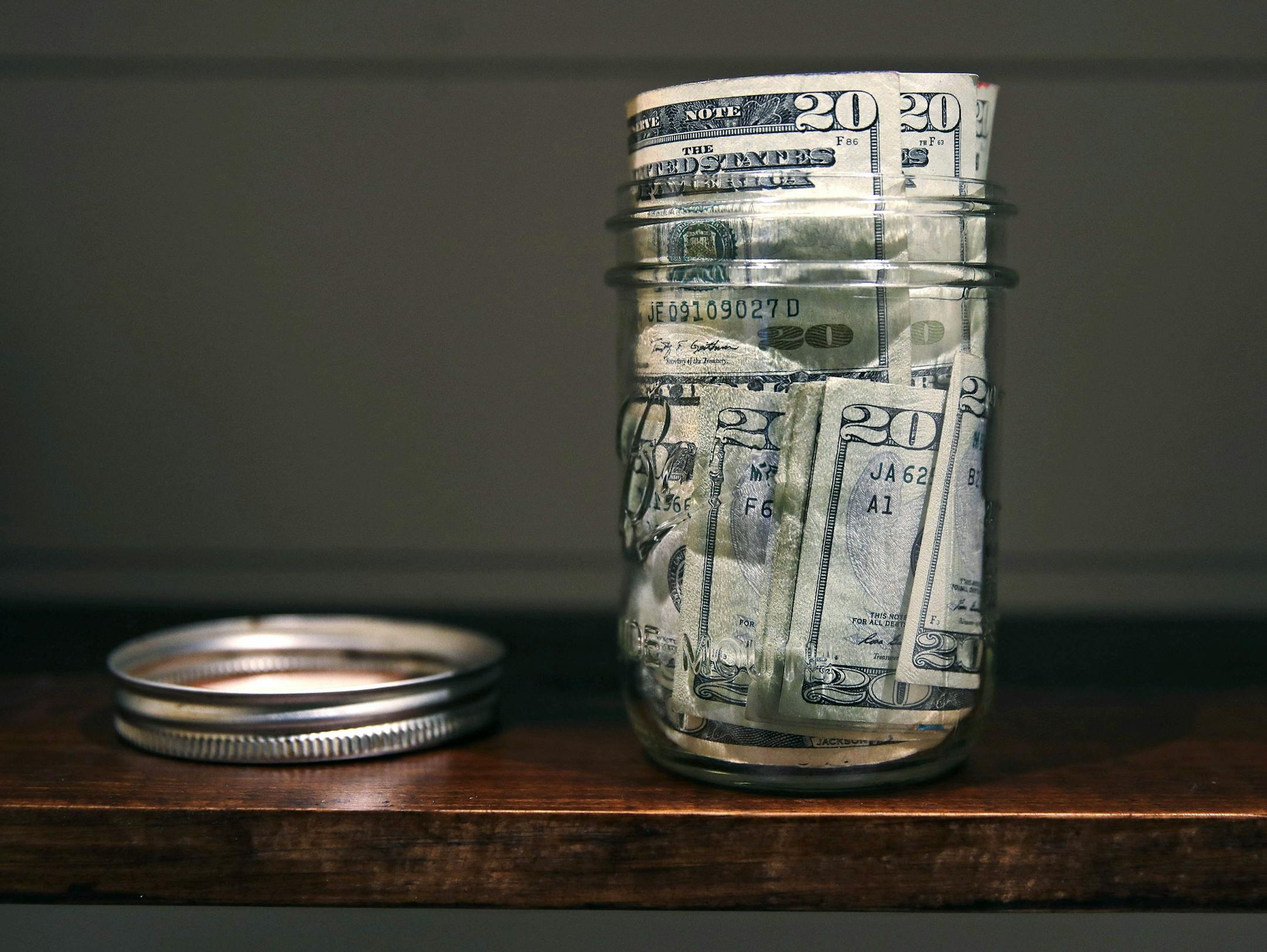 Canning jars are an outmoded way to save money. A better move would be finding a trusted and experienced financial adviser, especially in these volatile times.
