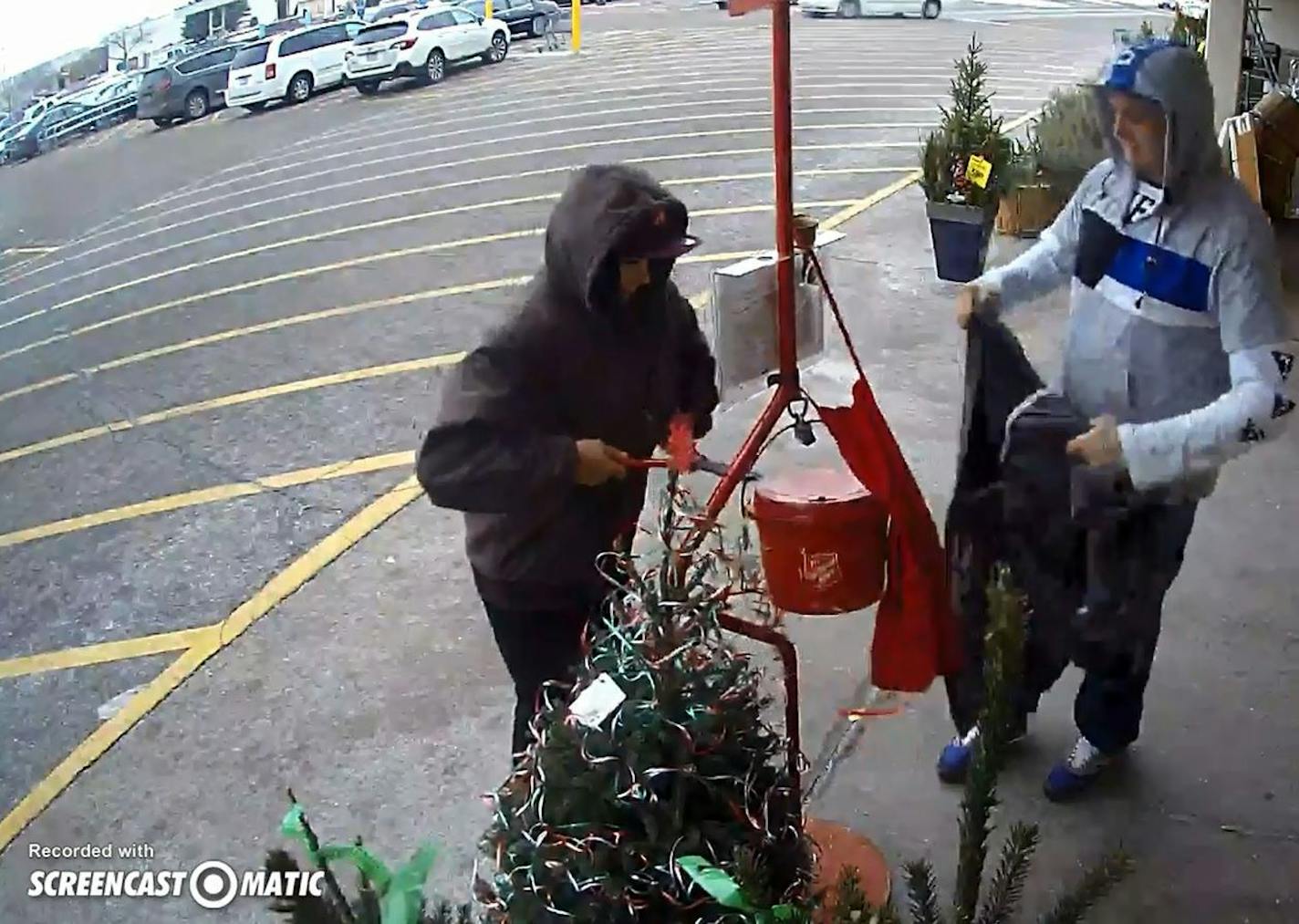 Police are asking for help in finding two suspects in hoods that stole the Salvation Army red kettle Tuesday at a Cub Foods in Blaine.