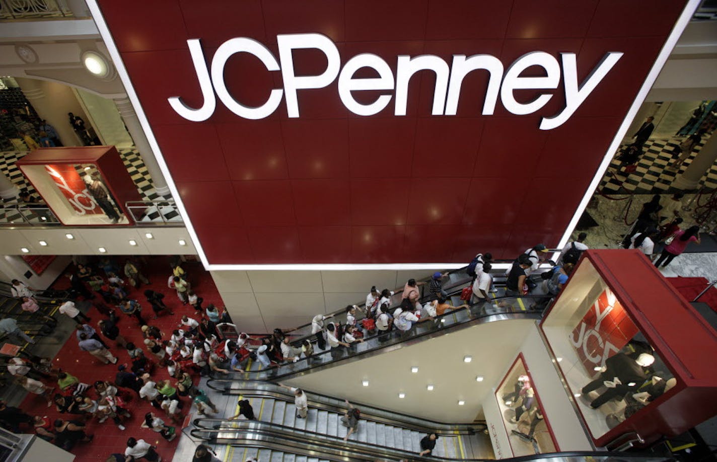 FILE - This July 31, 2009 file photo shows the main entrance of a J.C. Penney store in the Manhattan Mall in New York. J.C. Penney Co. is expected to report its earnings late Tuesday, May 15, 2012. (AP Photo/Mary Altaffer, File)