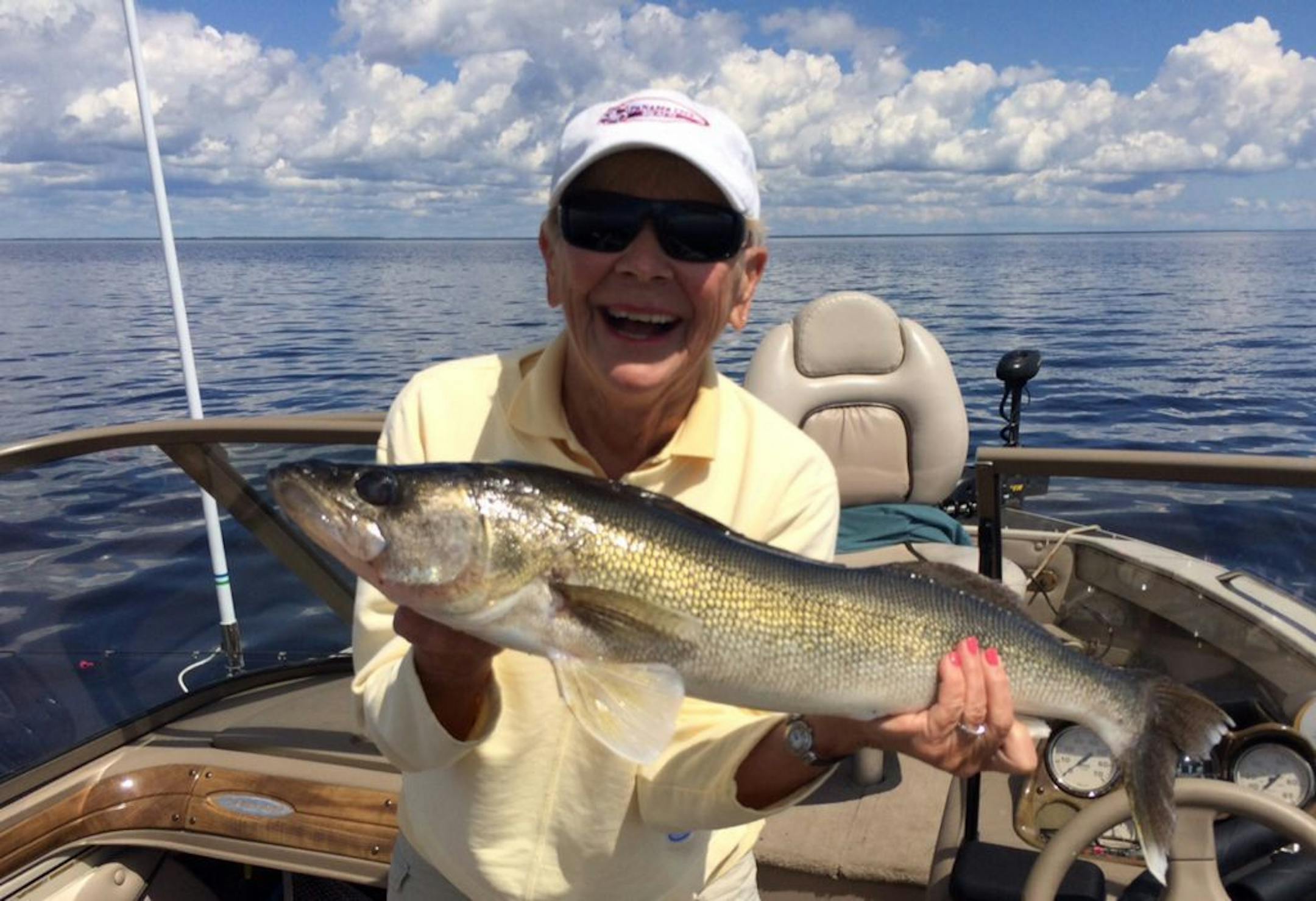 Bette Bryan, 75, of Chanhassen with a 30-inch walleye she caught and released this month on Lake of the Woods.