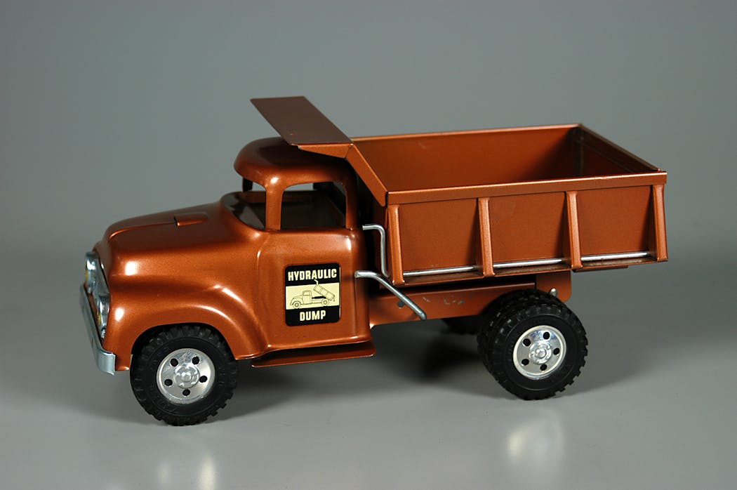 A hydraulic dump truck model manufactured by Tonka Toys.