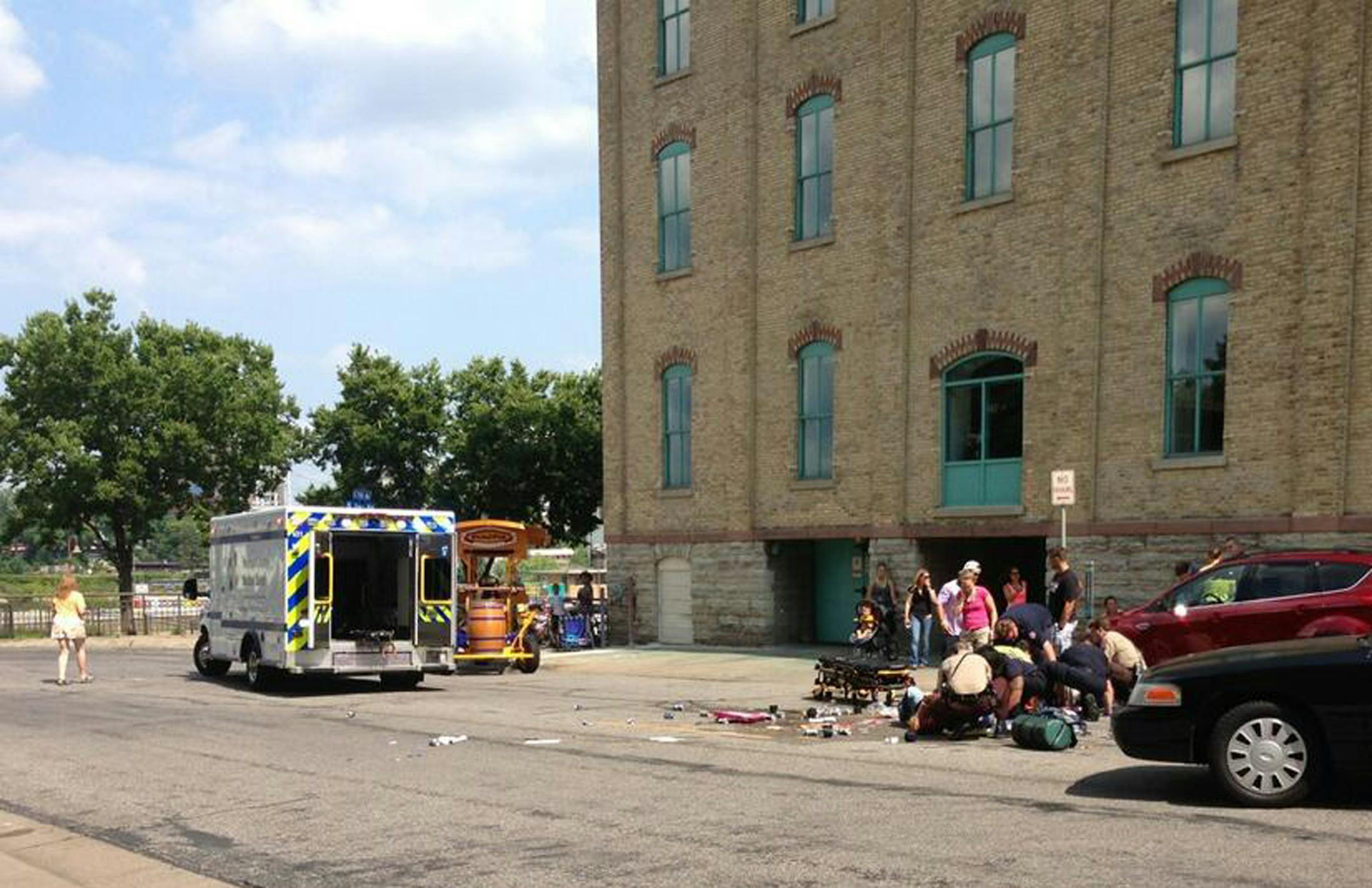 A pedal pub overturned close to 105 W. 5th Av. S., near Mill Ruins Park Thursday in Minneapolis. Several people needed help from police, and one person was taken by ambulance to a hospital.