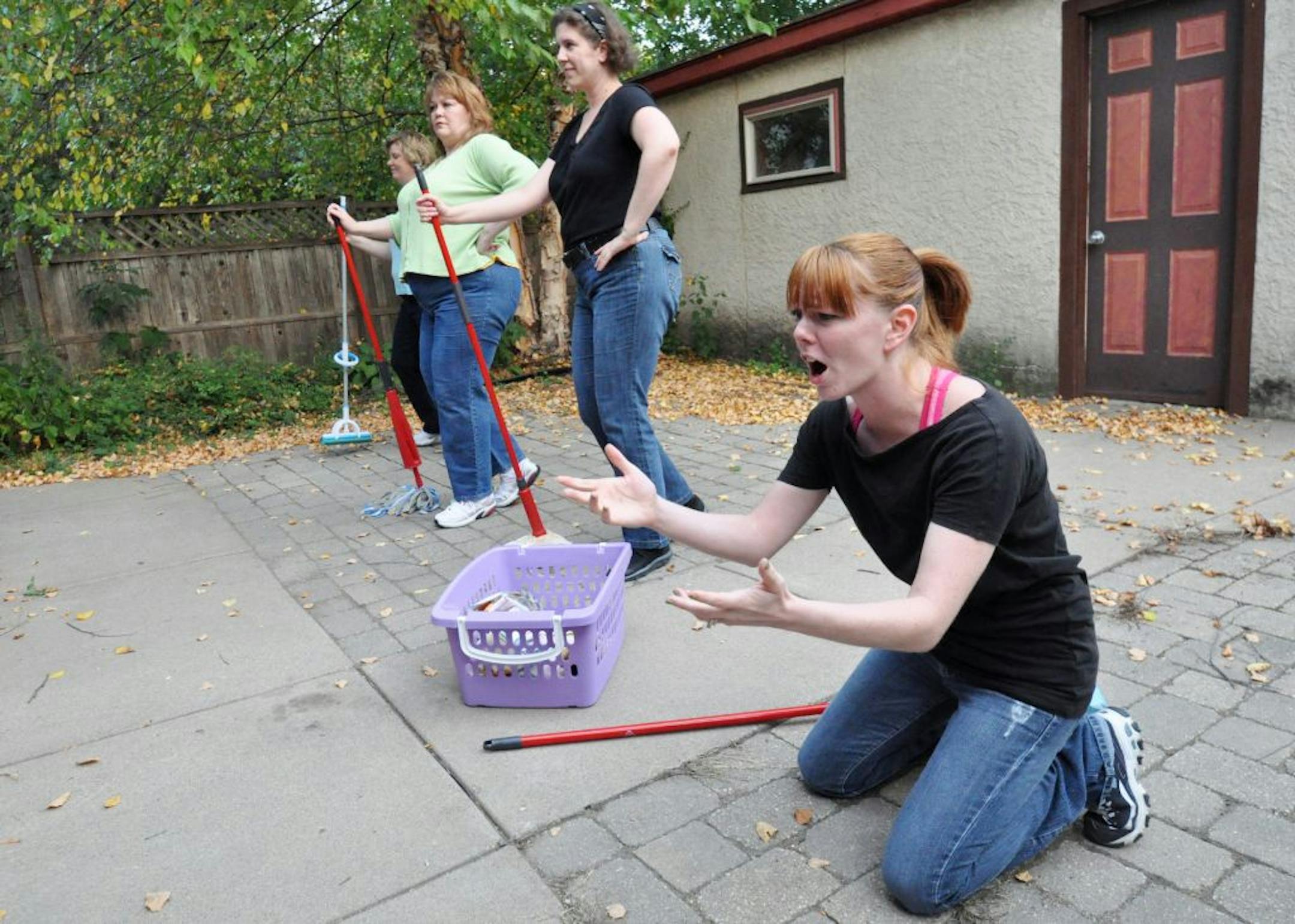 0074: (left to right) Marlo Miller of Burnsville, Lisa Diesslin of Maplewood, Kasey Scarpello of St. Paul, and Jessica Frederikson of Burnsville rehearse the song "Hot Mama Blues" for Chameleon Theatre's upcoming new play festival. Photo by Liz Ann Rolfsmeier