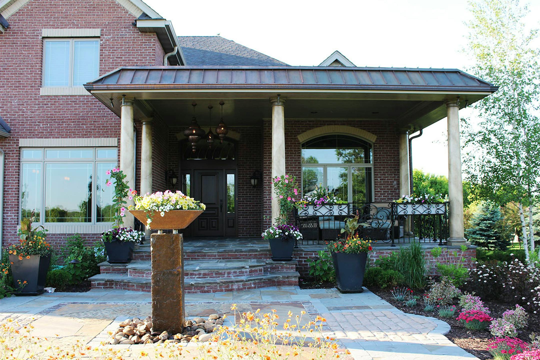 The new front porch welcomes guests to the home.