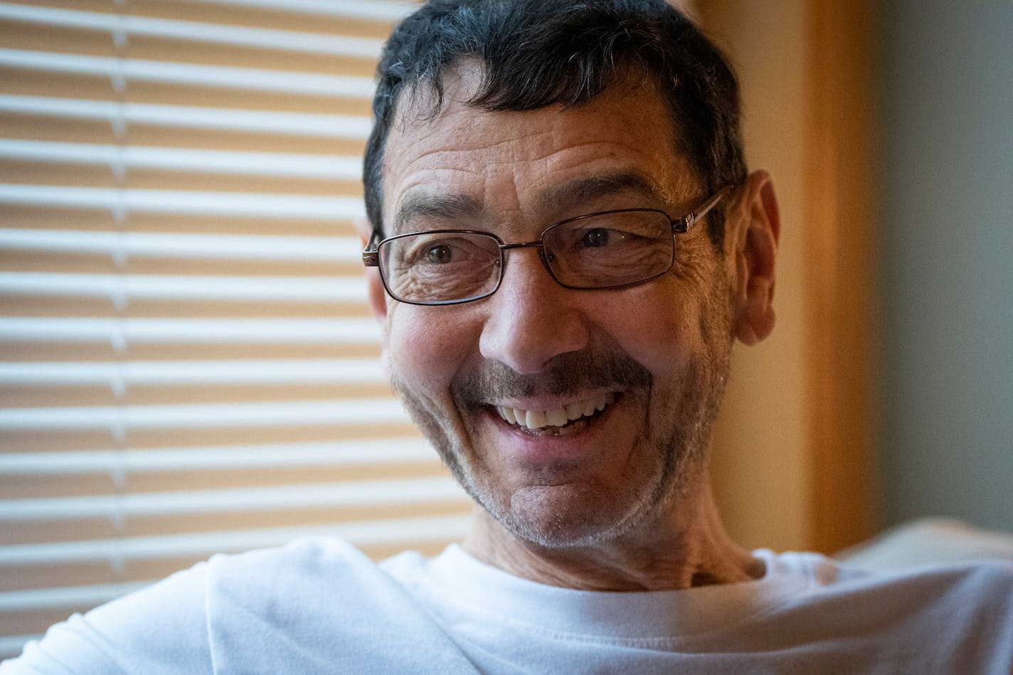 Steve DeBoer in his home in Rochester, Minn. In his prime, he did a marathon in 2:42:20, a 10K in 33:16 and 5K in 16:09.