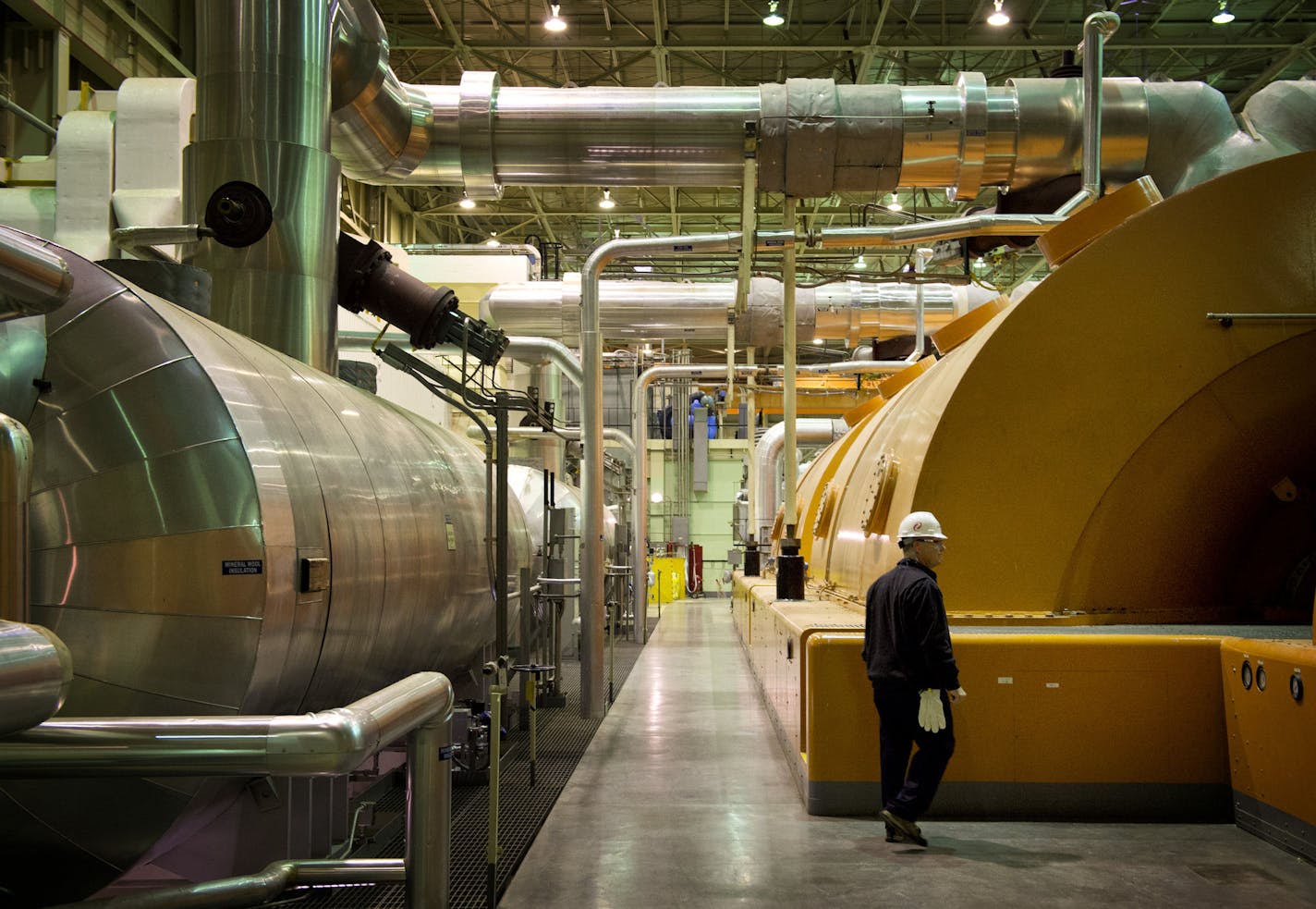 Terry Pickens, director of nuclear regulatory policy for Xcel Energy walked by one of two steam powered generators at the plant. Steam is heated in the nuclear vessel. The Xcel Energy Prairie Island Nuclear Plant north of Red Wing is looking to boost electrical output at the plant. Tuesday, October 9, 2012 ] GLEN STUBBE * gstubbe@startribune.com ORG XMIT: MIN1210091609103007 ORG XMIT: MIN1303271624141706