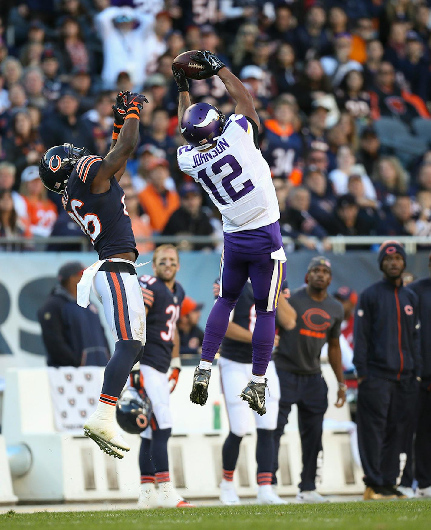 Vikings wide receiver Charles Johnson (12) set up the game winning touchdown with this 35 yard pass reception in front of Bears strong safety Antrel Rolle (26) under a minute left in the fourth quarter Sunday afternoon.