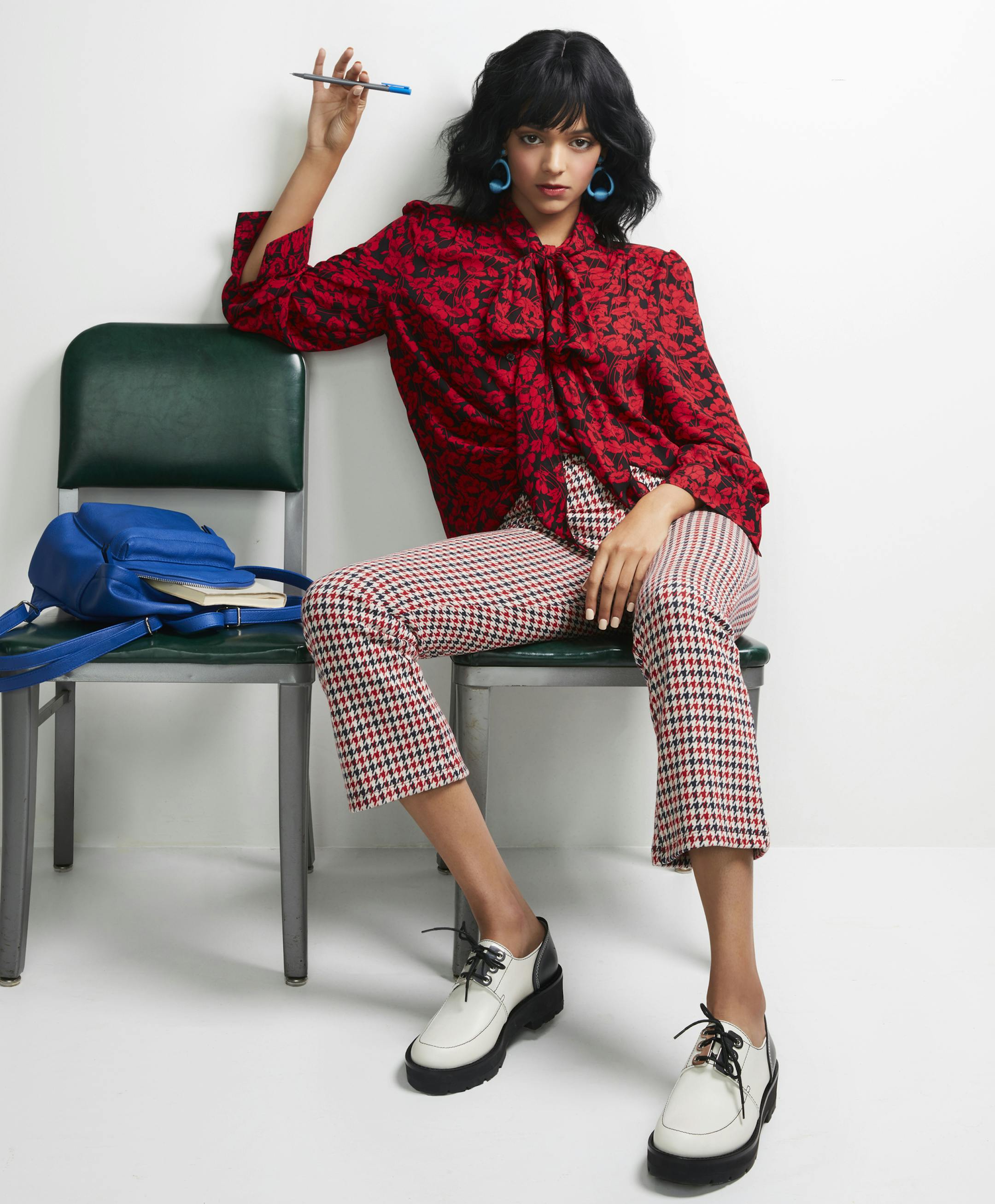 Houndstooth Floral blouse $30, blue backpack $12 target.com
Houndstooth pant $78 freepeople.com Phillip Lim Shoes $190, turquoise earrings $12 nordstromrack.com Photographer Lauren Krysti Creative Director and Stylist Barbara Schmidt, studiobstyle
Hair and Make-up Artist Fatima Olive
Model Megan Keefe, Ignite Models