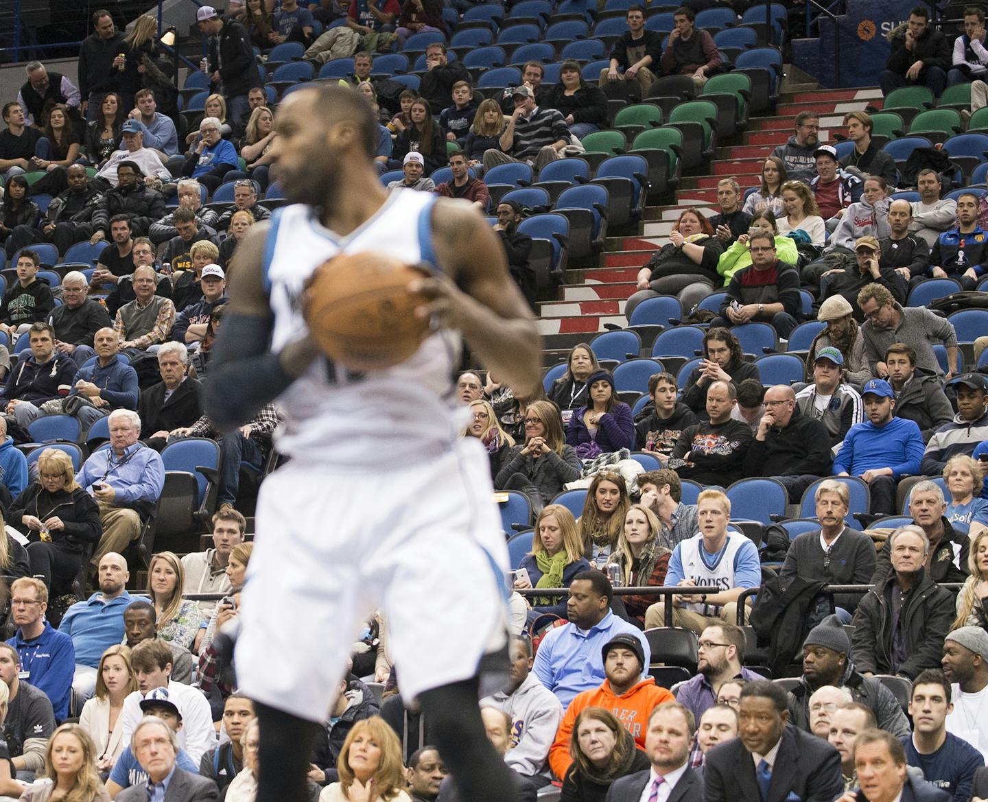 Seats are about half full behind Minnesota Timberwolves forward Shabazz Muhammad (15) as he pulls down the ball during a game against the Phoenix Suns in early January. ] (Aaron Lavinsky | StarTribune) The Minnesota Timberwolves play the Phoenix Suns Wednesday, Jan. 7, 2014 at Target Center in Minneapolis. ORG XMIT: MIN1501151603093186