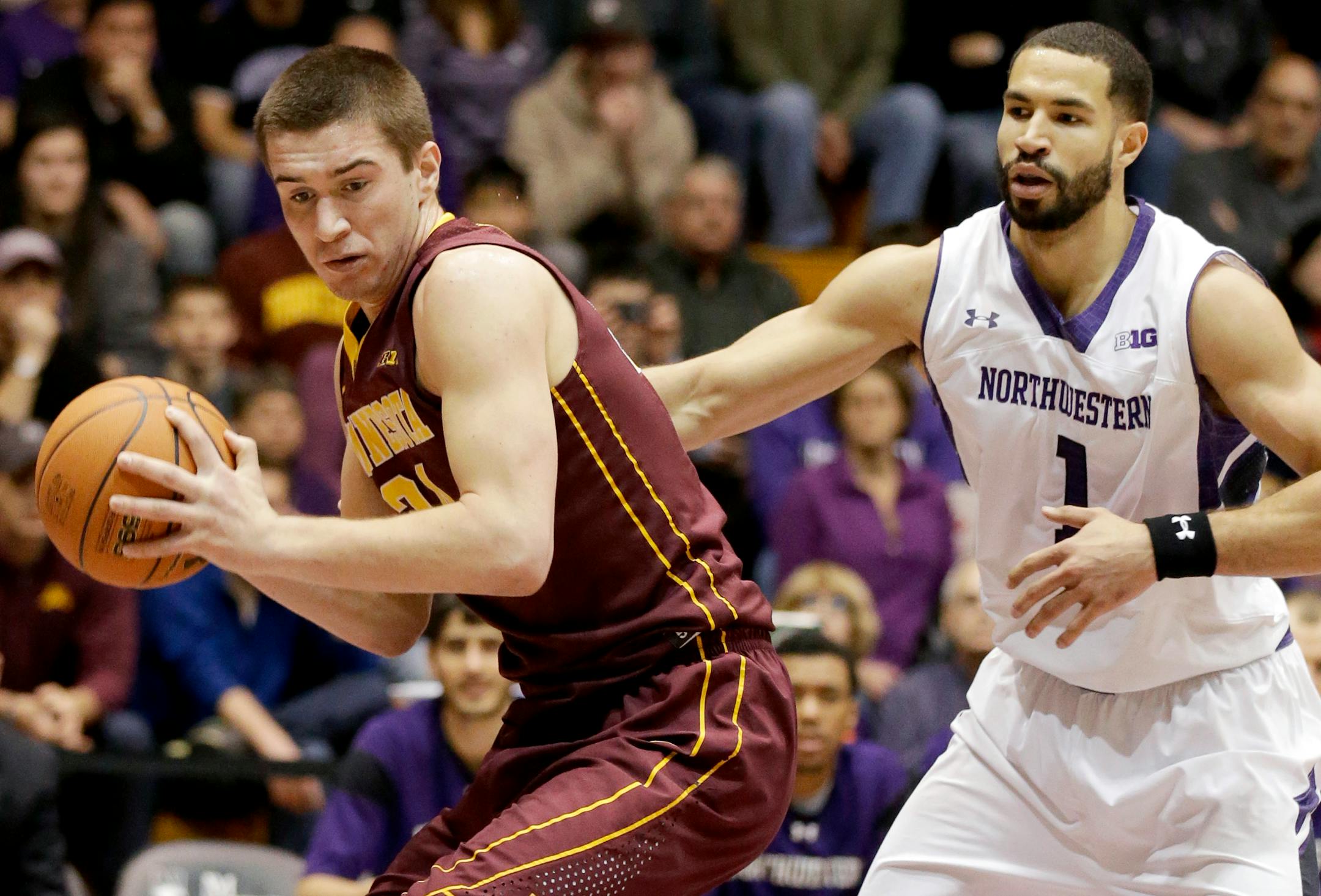 "We're not going to feel sorry for ourselves," Minnesota forward Joey King, left, said about playing in the NIT.