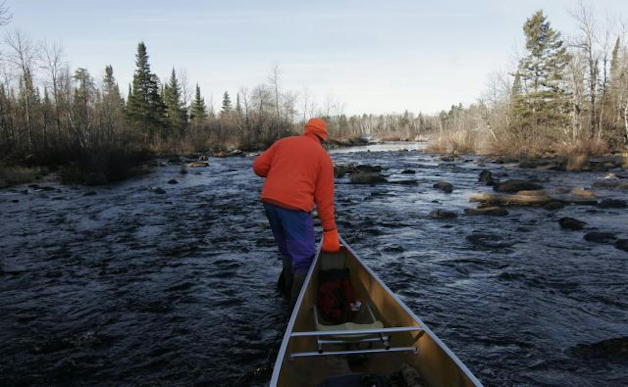 The St. Louis River in northeastern Minnesota was rocky and shallow in places, forcing Star Tribune outdoor writer Doug Smith and his partner to drag their canoe. That didn't help their deer hunting prospects.