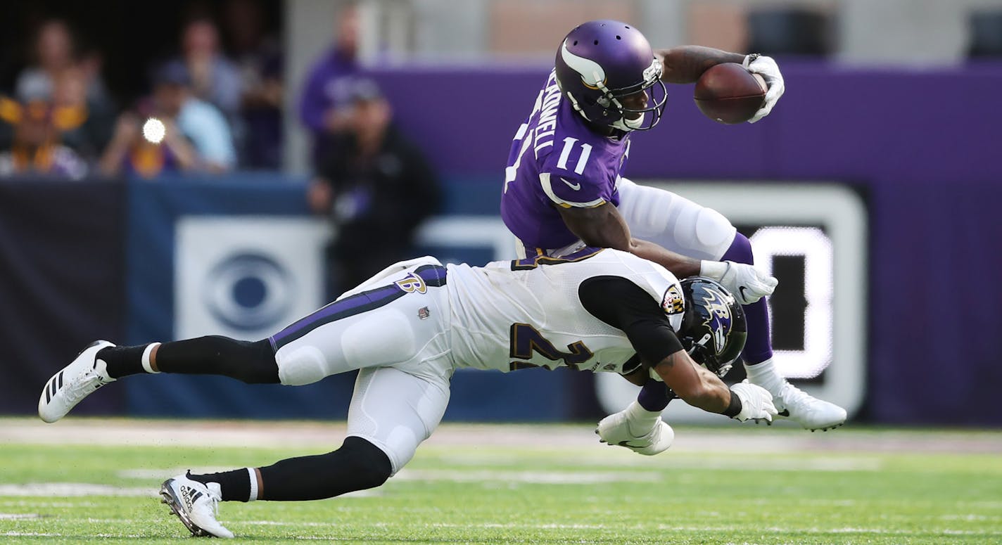 Minnesota Vikings wide receiver Laquon Treadwell (11) was upended by Baltimore Ravens cornerback Jimmy Smith (22) in the second quarter at U.S Bank Stadium Sunday October 22,2017 Minneapolis , MN. ] JERRY HOLT &#xef; jerry.holt@startribune.com