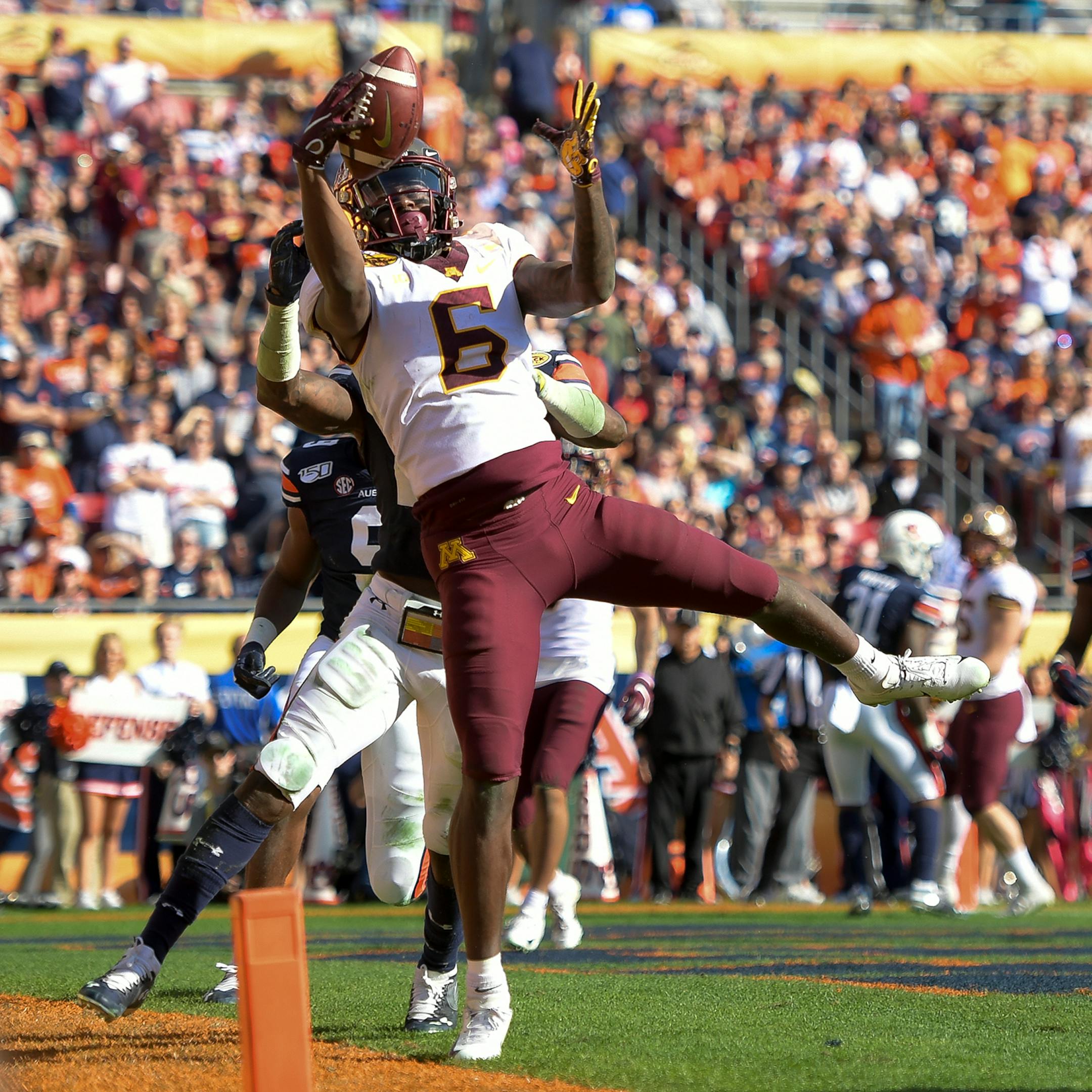 Minnesota Gophers wide receiver Tyler Johnson (6) scored a touchdown late in the second quarter against the Auburn Tigers.