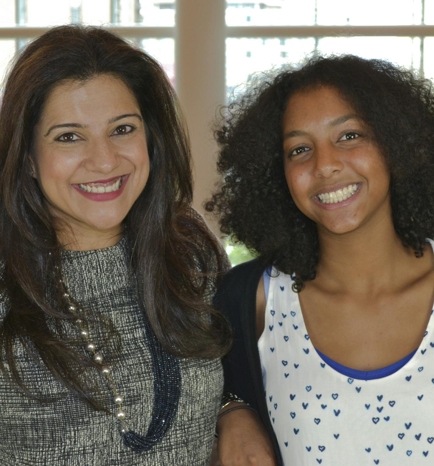 Reshma Saujani, left, CEO of Girls Who Code, and Minneapolis South High School senior Nailah Abdullah.