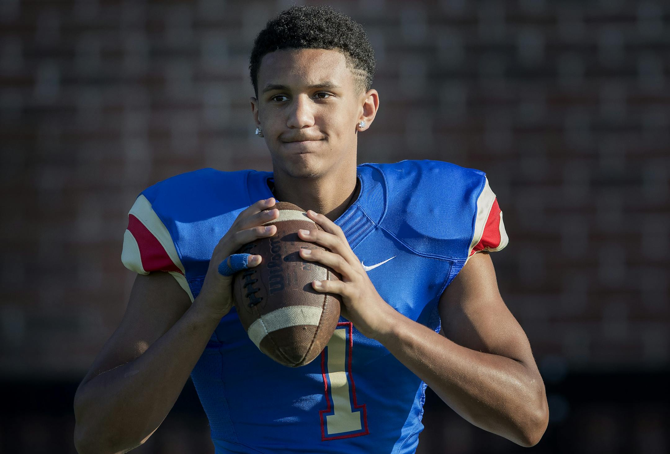SMB Wolfpack quarterback Jalen Suggs during an intra-squad scrimmage. ] CARLOS GONZALEZ ï cgonzalez@startribune.com - August 23, 2017, Hopkins, MN, Blake School, SMB Wolfpack , Amid growing sport specialization, some of the best quarterbacks this season are basketball stars, too. QB Jalen Suggs