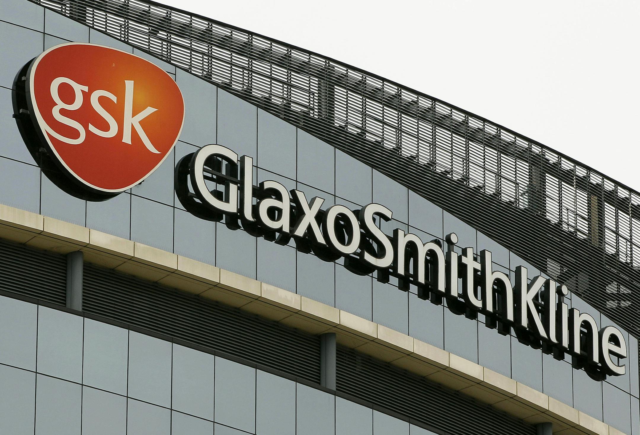 This Wednesday, April 28, 2010, file photo. shows the GlaxoSmithKline offices in London. GlaxoSmithKline LLC will pay $3 billion and plead guilty to promoting two popular drugs for unapproved uses and to failing to disclose important safety information on a third in the largest health care fraud settlement in U.S. history, the Justice Department said Monday, July 2, 2012. (AP Photo/Kirsty Wigglesworth) ORG XMIT: MIN2013091616275299