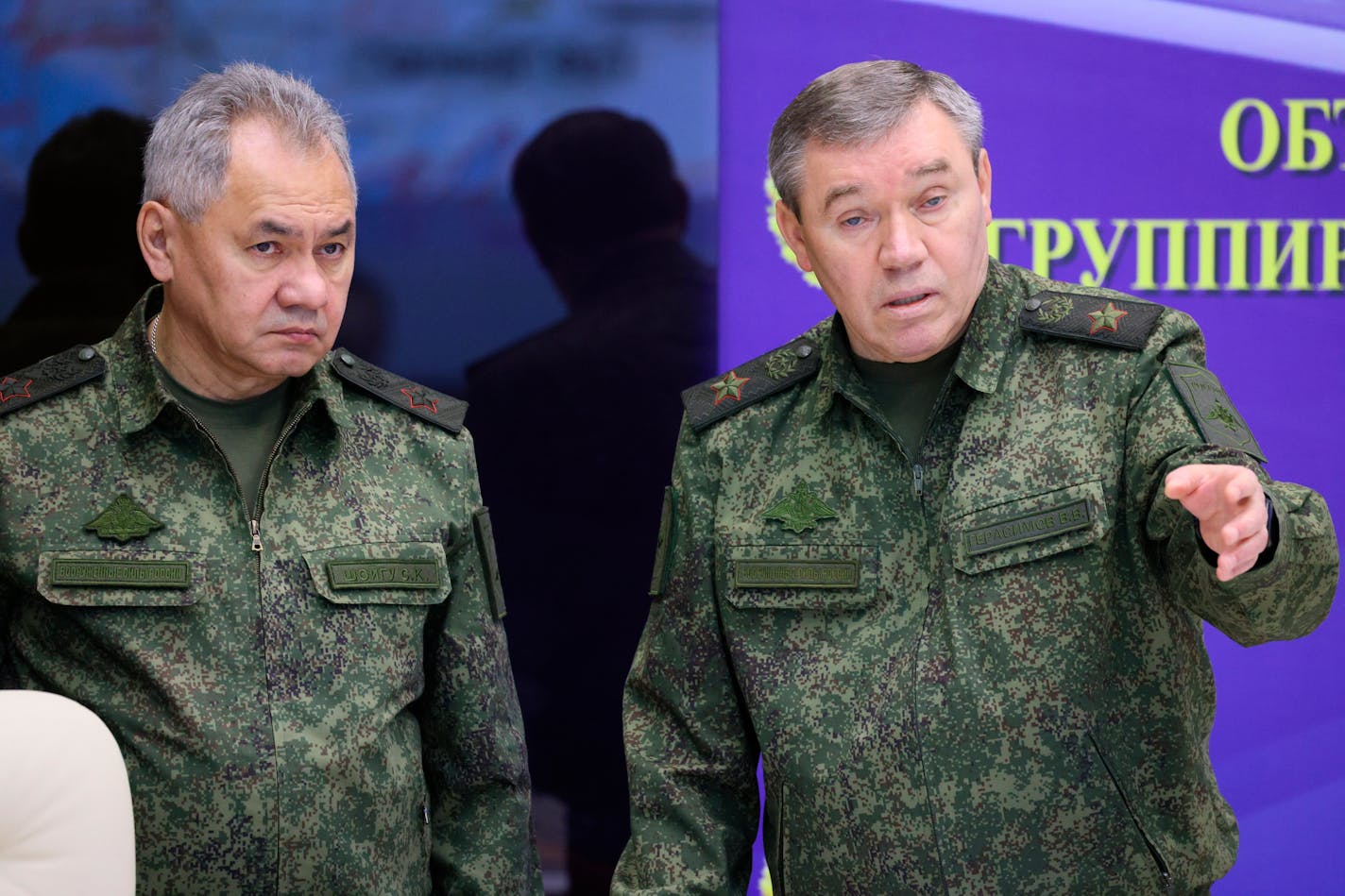 Russian Defense Minister Sergei Shoigu, left, and Chief of the Russian General Staff Valery Gerasimov attend the meeting with Russian President Vladimir Putin during his visit to the joint staff of troops involved in Russia's military operation in Ukraine, at an unknown location, Saturday, Dec. 17, 2022. (Gavriil Grigorov, Sputnik, Kremlin Pool Photo via AP)