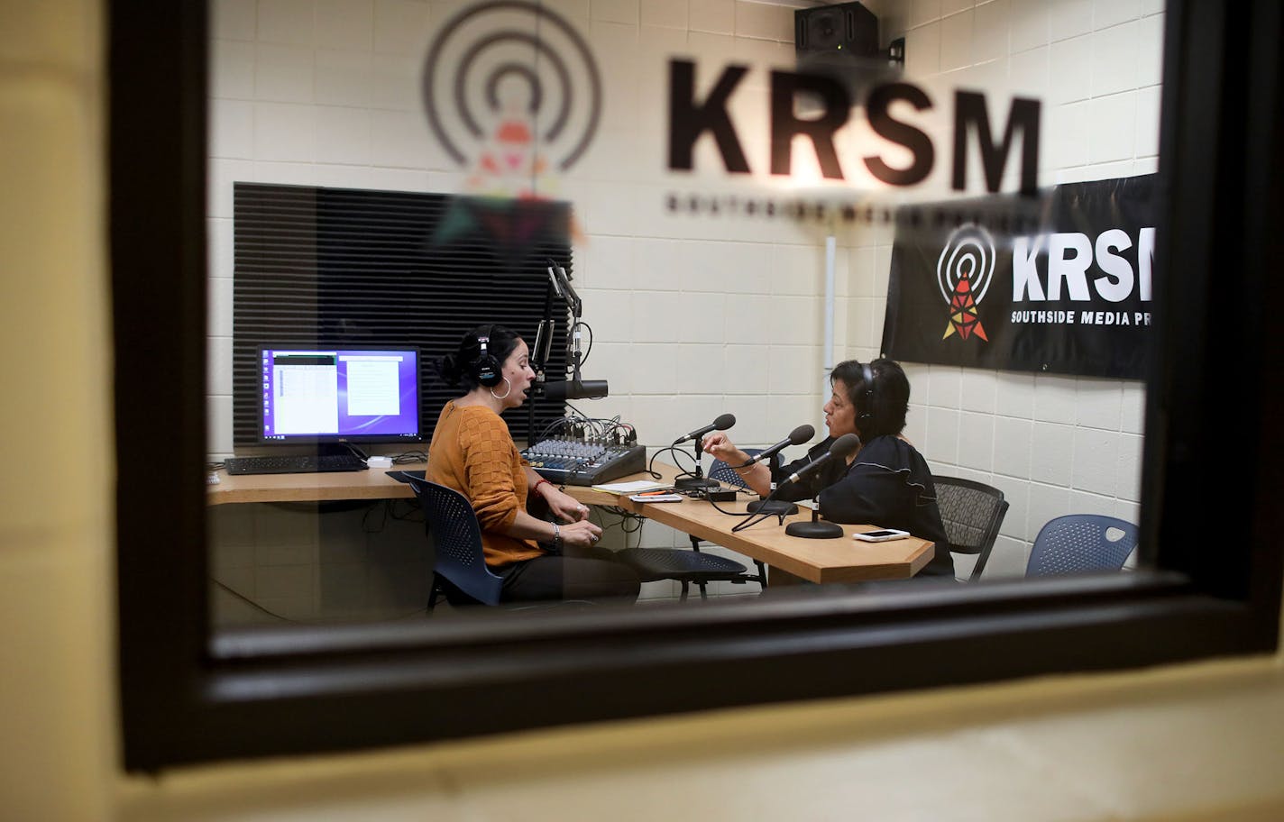 Pillsbury United Communities operates a radio station, KRSM, out of the Wait House in the Phillips Community Center, Here, Briana Santoscoy, left, host of a Spanish language show called Education in Power, spoke with guest Elia Dimayuga-Bruggeman, special assistant to the Commissioner at the Minnesota Department of Education, where they spoke about finding success and navigating the educational system for Latinos during her show Wednesday, June 27, 2018, in Minneapolis, MN.] DAVID JOLES &#xef; d