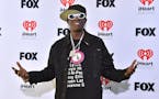 FILE - Flavor Flav arrives at the iHeartRadio Music Awards on Monday, April 1, 2024, in Los Angeles. Maggie Steffens asked for more support for the U.