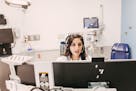 Dr. Meeta Shah, an emergency room doctor, took video calls at Rush University Medical Center, which is using telemedicine to screen and treat patients