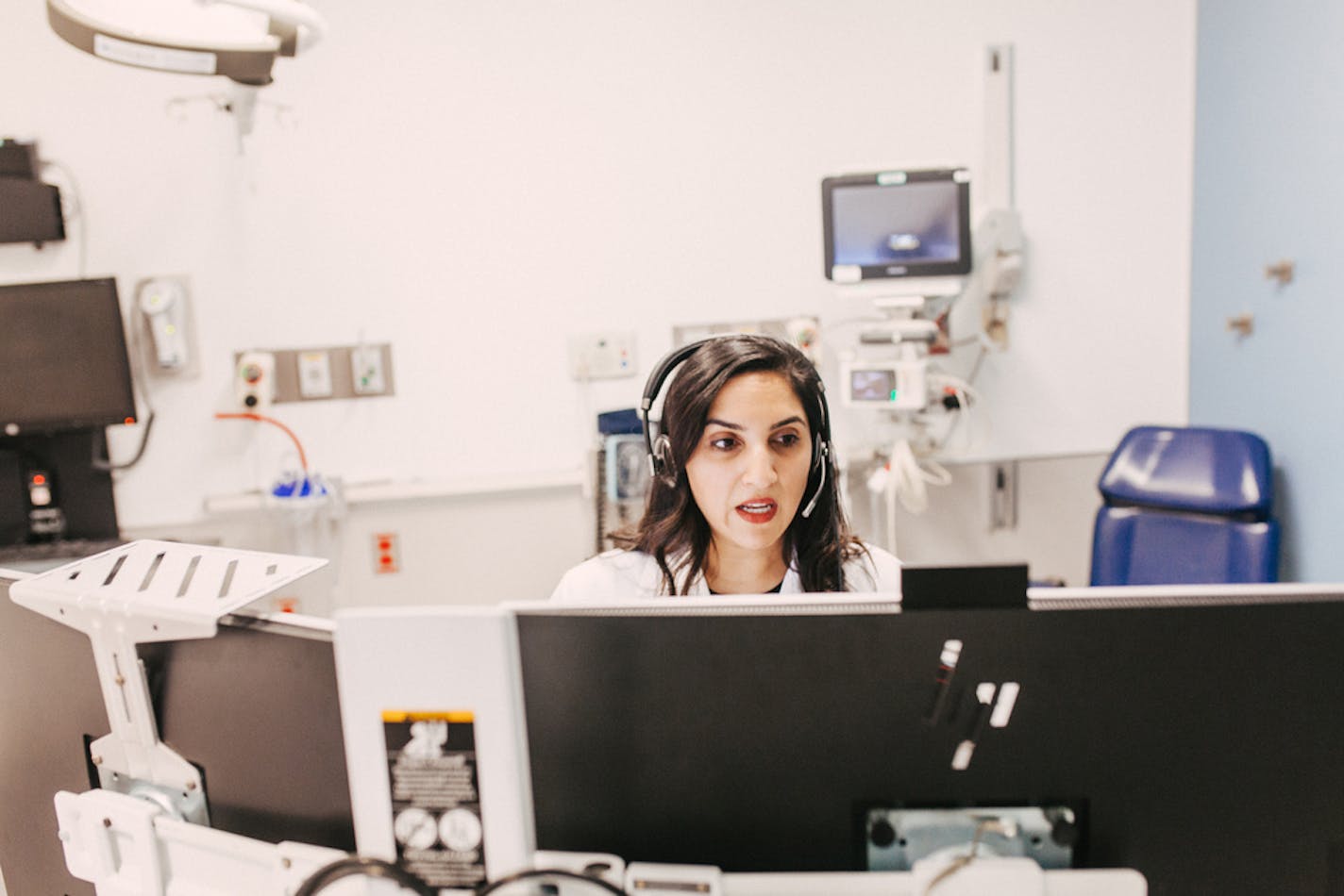 Dr. Meeta Shah, an emergency room doctor, took video calls at Rush University Medical Center, which is using telemedicine to screen and treat patients, in Chicago on March 6, 2020.