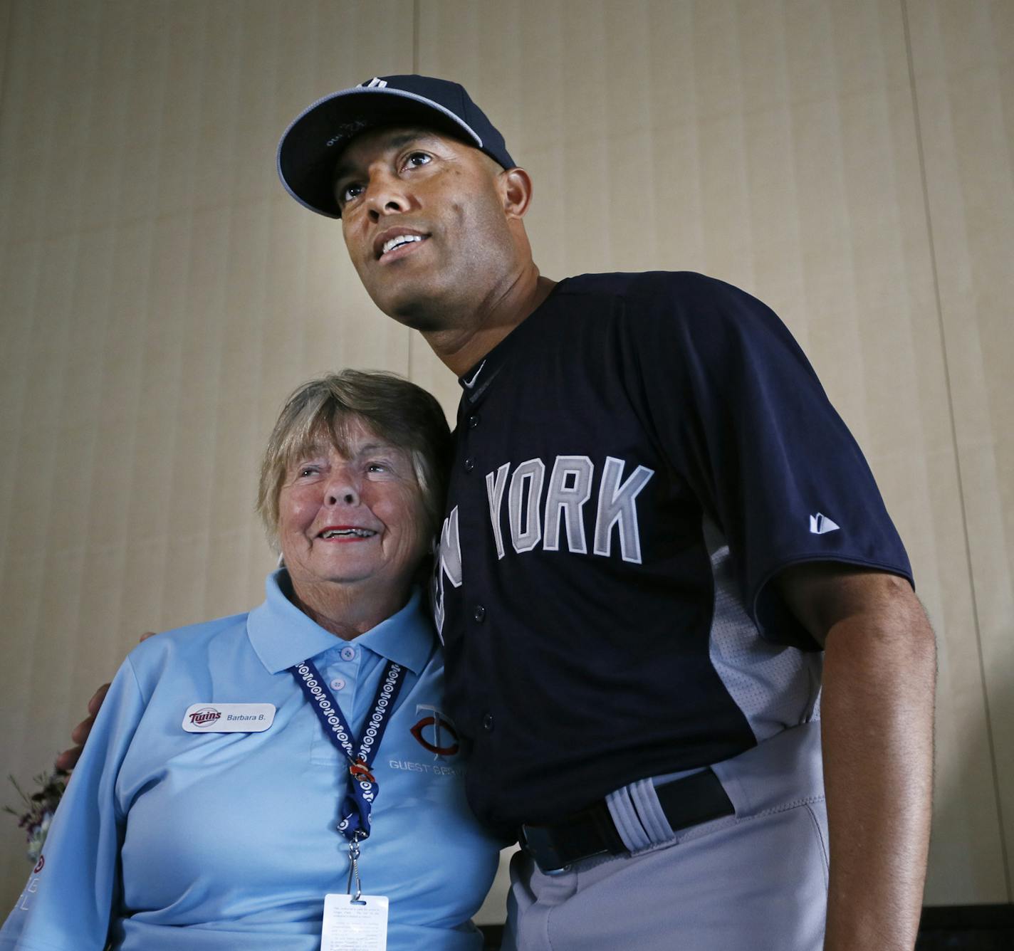 New Yankees closer Mariano Rivera posed for a photo with Barb Barnes and ushers at Target Field during a meeting with people behind the scenes at Target Field on Tuesday night July, 2, 2013. Minneapolis, MN . Rivera is meeting with folks behind the scene at every stadium that the Yankees play in this year. ] JERRY HOLT &#x201a;&#xc4;&#xa2; jerry.holt@startribune.com