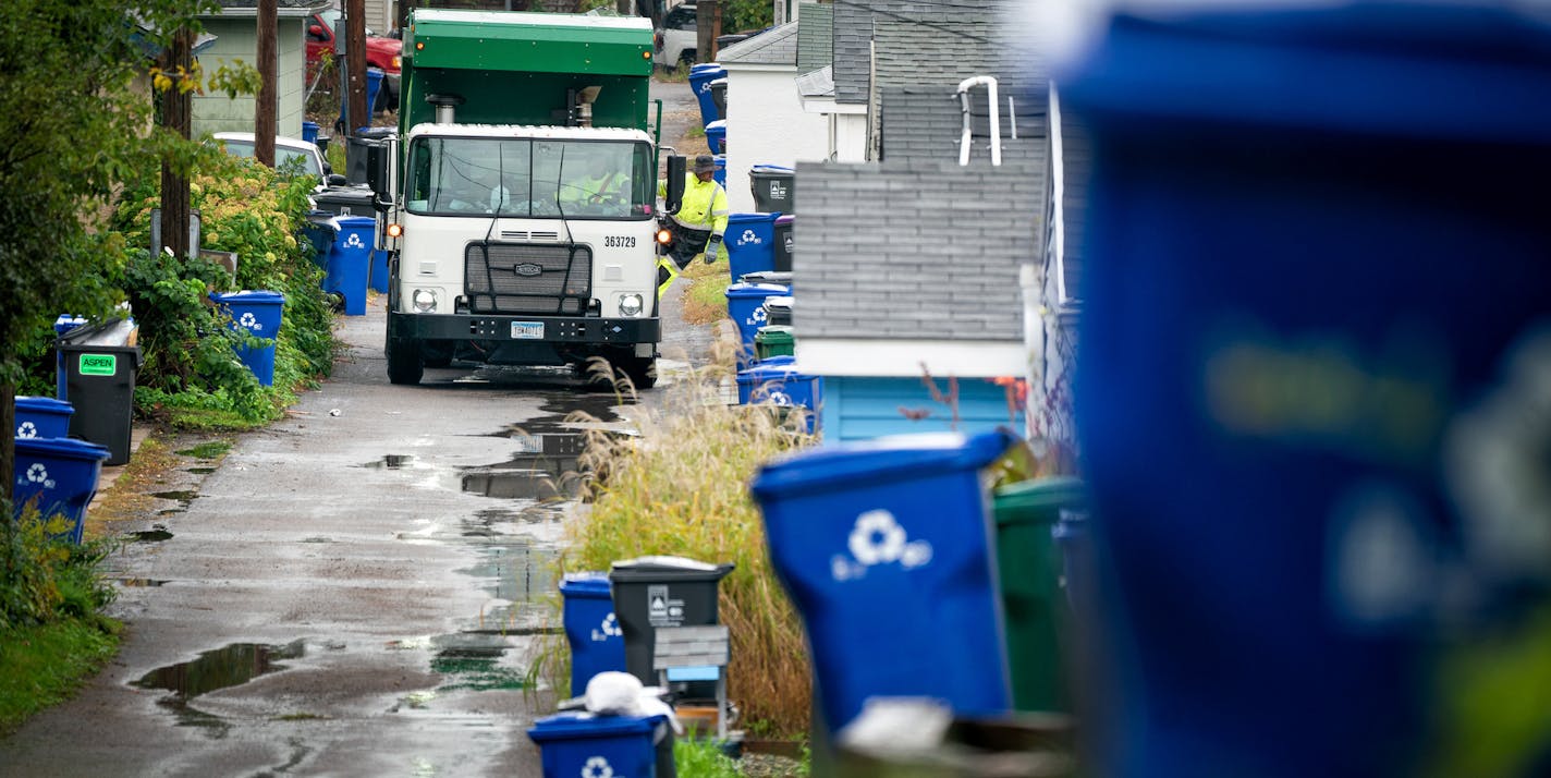 Waste Management worker Daniel Westerhaus collected trash from the alleys of the Snelling Hamline neighborhood of St Paul's yellow zone on the first day of organized trash collection. ] GLEN STUBBE &#x2022; glen.stubbe@startribune.com Monday, October 1, 2018 St. Paul has begun its organized trash collection, a dramatic shift in how the city collects its waste. Scattered reports of residents using the wrong bins, but so far no major snafus.
What's Happening at this time: Organized trash collectio