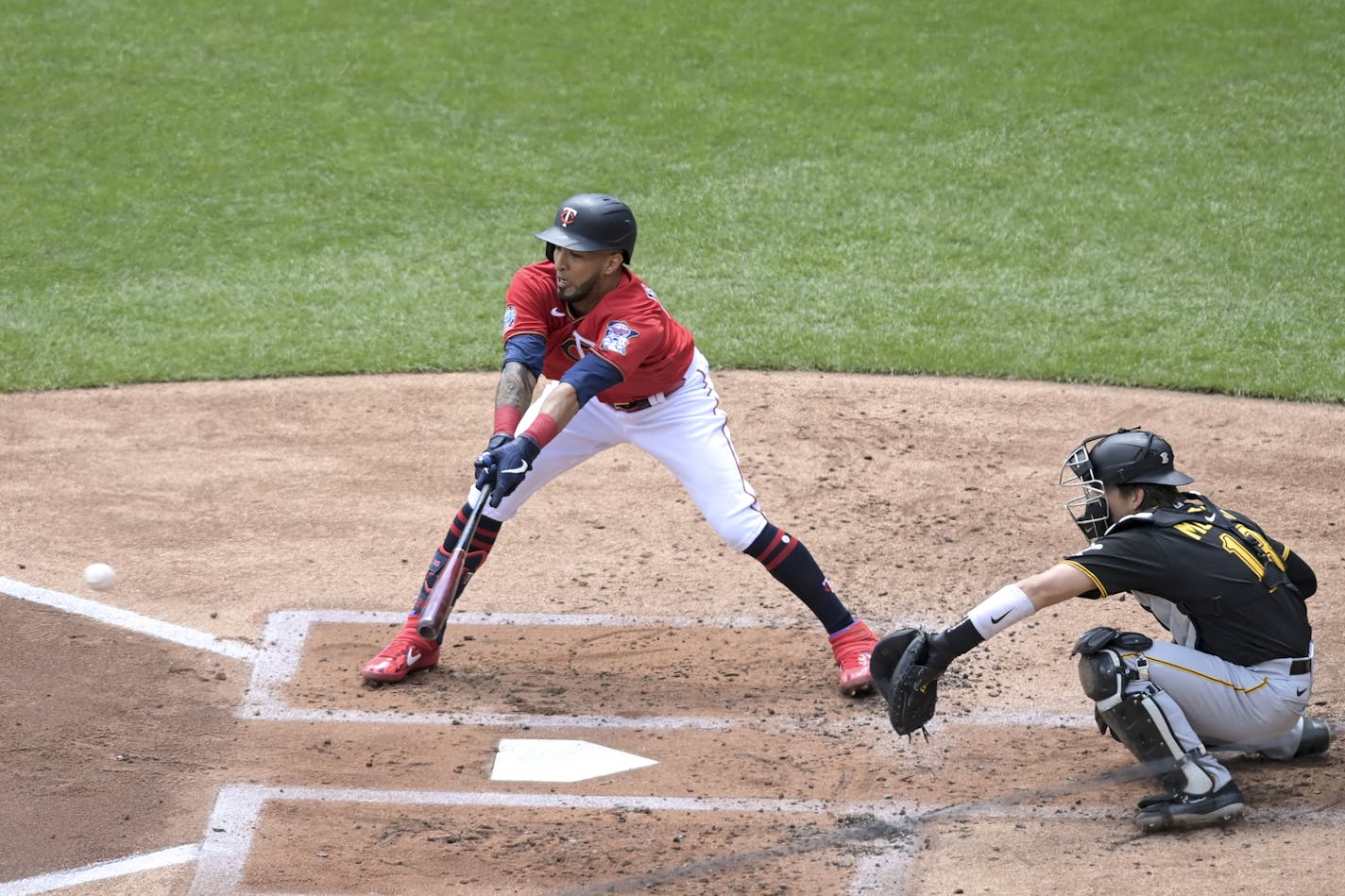 Minnesota Twins right fielder Eddie Rosario (20) hit an RBI single, bringing home center fielder Max Kepler (26) in the bottom of the first inning. ] aaron.lavinsky@startribune.com The Minnesota Twins played the Pittsburgh Pirates on Tuesday, Aug. 4, 2020 at Target Field in Minneapolis, Minn.