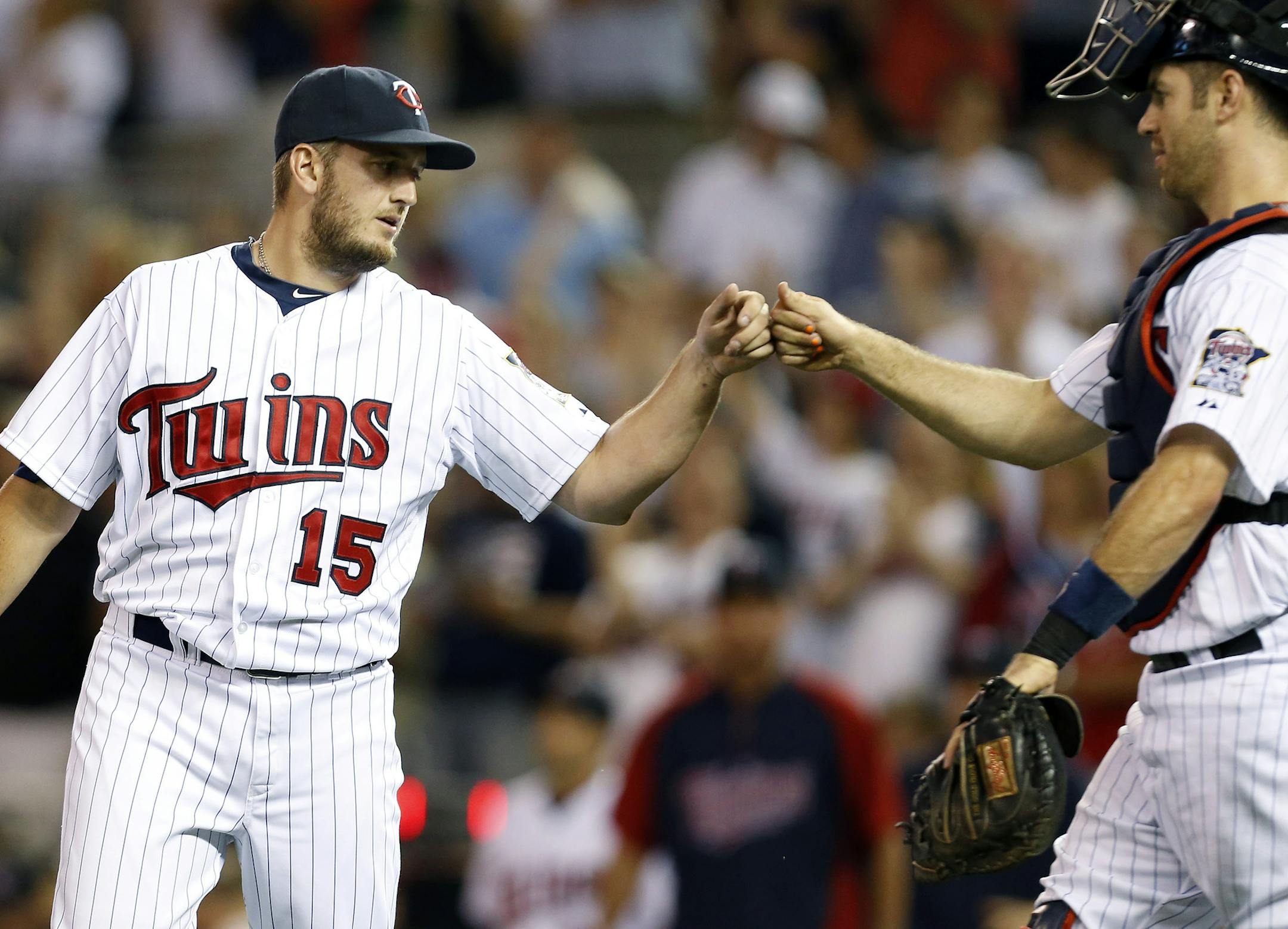 Minnesota Twins pitcher Glen Perkins (15) was congratulated by catcher Joe Mauer (7) after getting the save. Minnesota beat Kansas City by a final score of 3-1. ] CARLOS GONZALEZ cgonzalez@startribune.com June 27, 2013, Minneapolis, Minn., Target Field, MLB, Minnesota Twins vs. Kansas City Royals