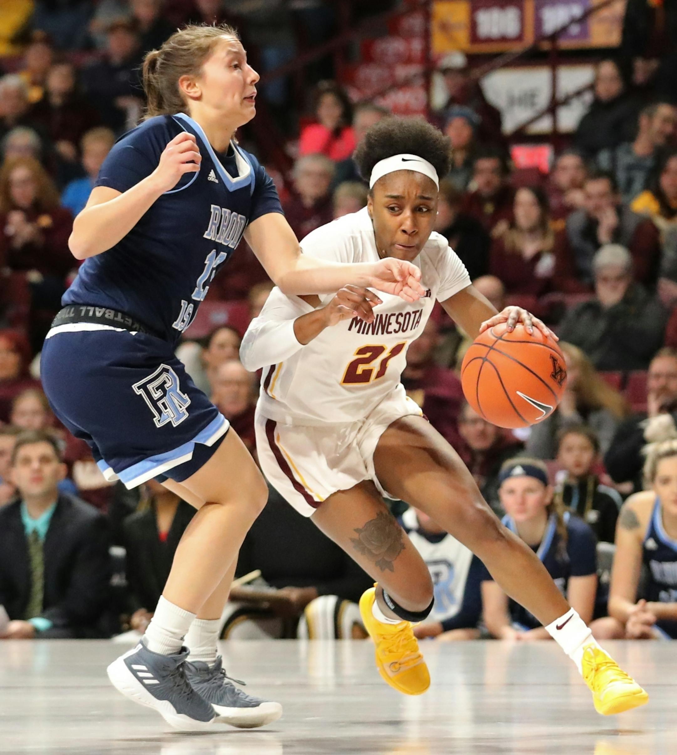 Gophers guard Jasmine Brunson (21) was harassed by Rhode Island defender Marta Vargas (13) in the first half.