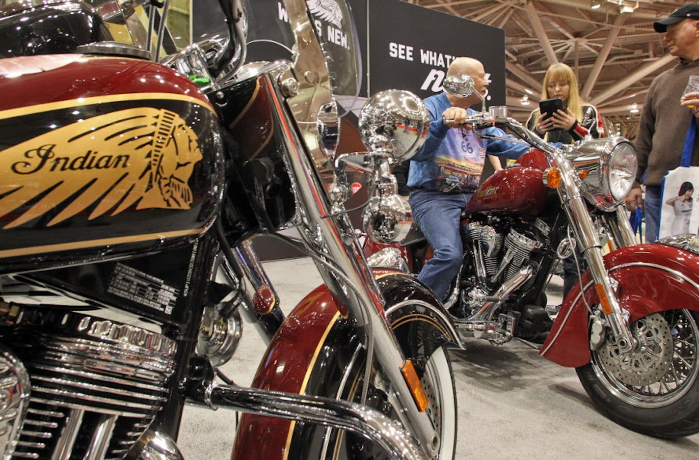 Polaris and Indian Motorcycles are combining forces in launching a new motorcycle for 2014. The Motorcycle Show at the Minneapolis Convention Center featured a display of cycles. Show patrons sat on the Indian 2013 models. (MARLIN LEVISON/STARTRIBUNE(mlevison@startribune.com (cq - ) ORG XMIT: MIN1301111801230881