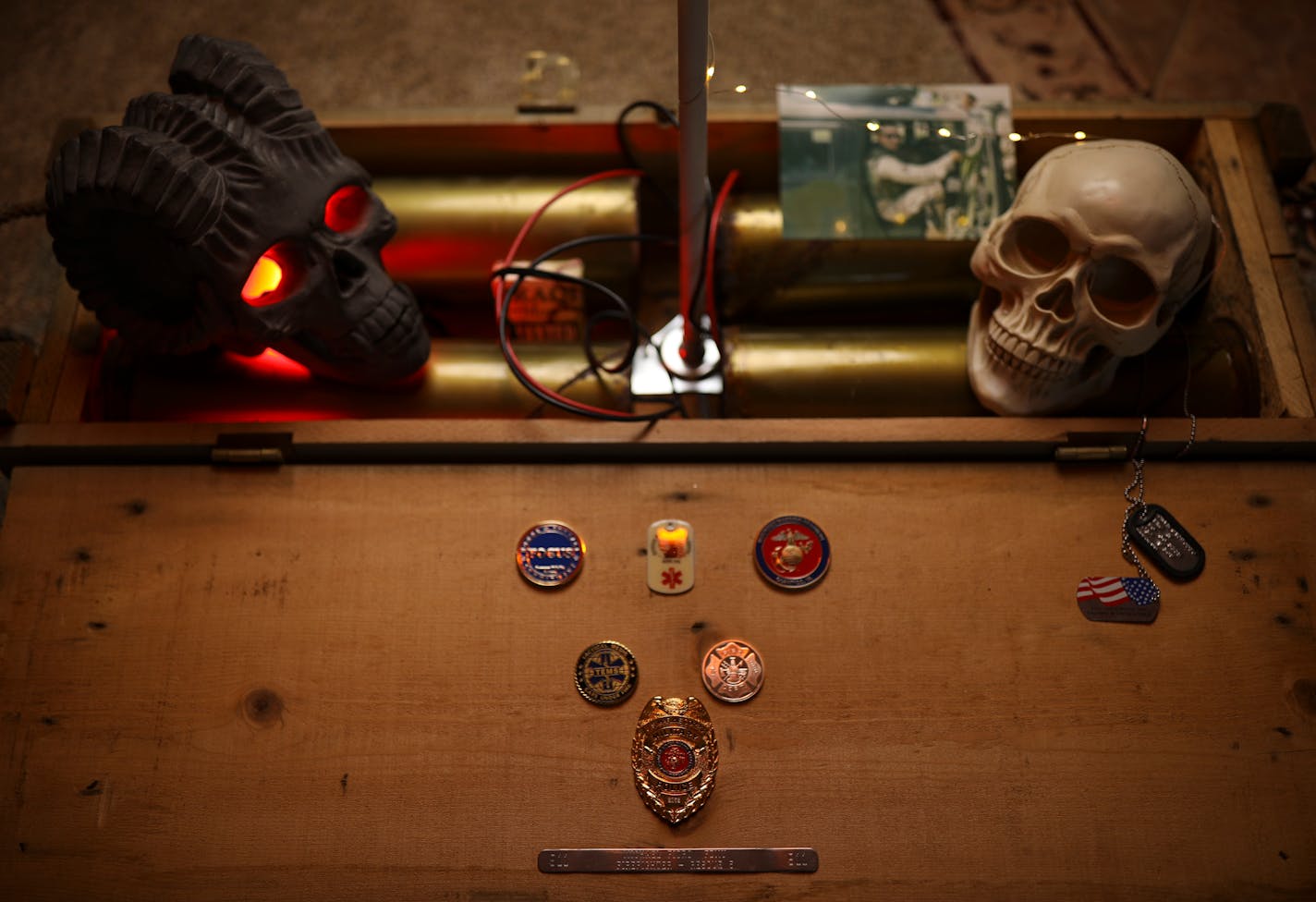 Among the items the scupture incorporates are his Military Police badge, dog tag, and four (empty) 155mm shell casings wired in a similar fashion to the improvised explosive devices he encountered during his tour of duty in Iraq.