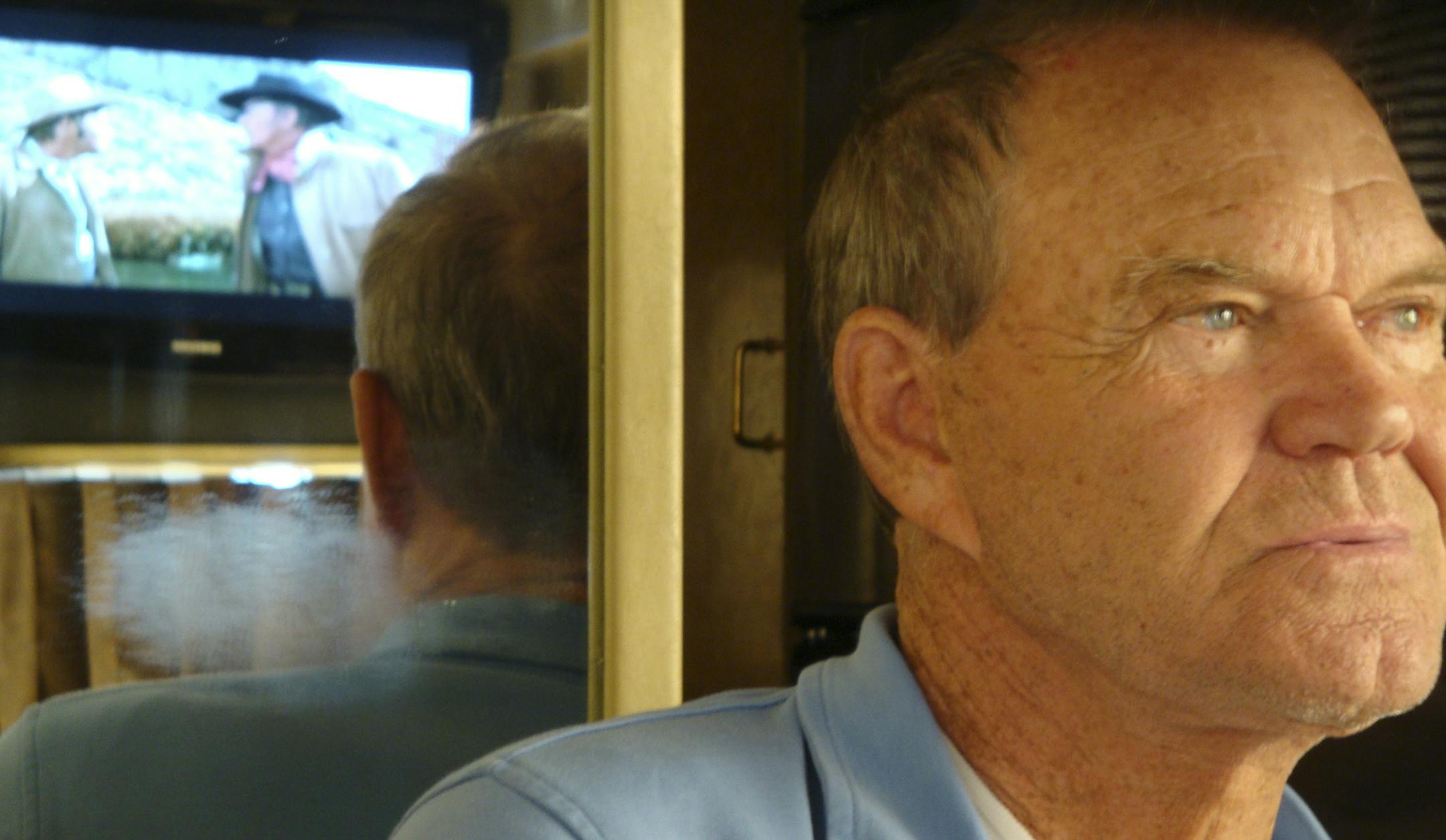 An undated handout image from the James Keach directed documentary "I'll Be Me," of Glen Campbell relaxing on his tour bus. The film follows the country music star, recognized as instrumental in bringing the genre into the pop mainstream during the late 60s, on a final concert tour as he and his family deal with his advancing Alzheimer's disease. (Richard Landers/PCH Films via The New York Times) -- PHOTO MOVED IN ADVANCE AND NOT FOR USE - ONLINE OR IN PRINT - BEFORE OCT. 26, 2014. -- NO SALES;