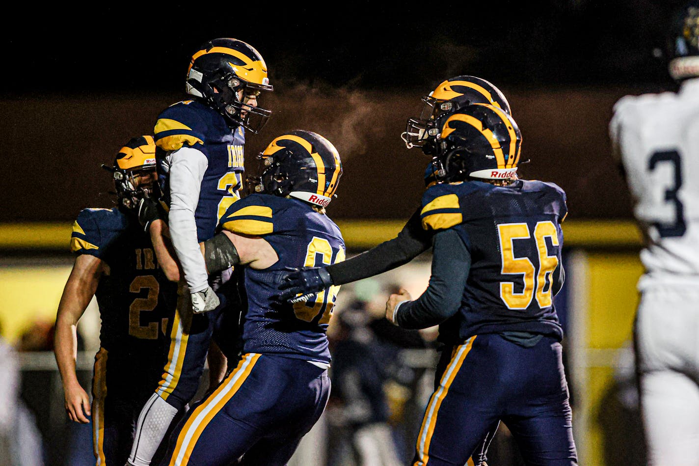 Rosemount reeiver Chance Swansson (cq) got a lift from teammates after scoring the go-ahead touchdown on a pass from quarterback Gavin Caswell. Rosemount went on to win 27-17. Prior Lake at Rosemount, football, 10-14-22. Photo by Mark Hvidsten, SportsEngine