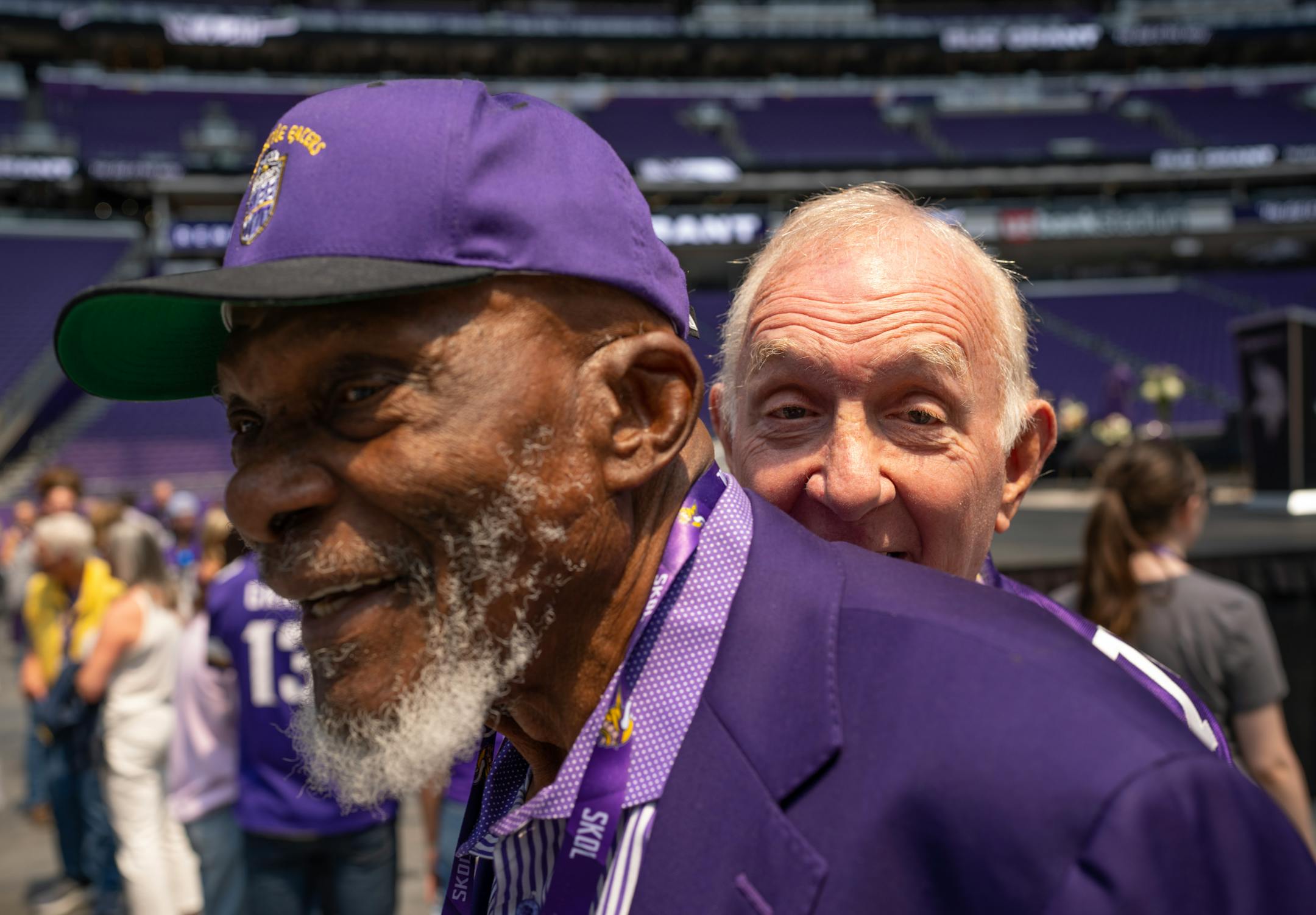 Former Vikings players Bob Lurtsema and Carl Eller, foreground, clowned around after the program.