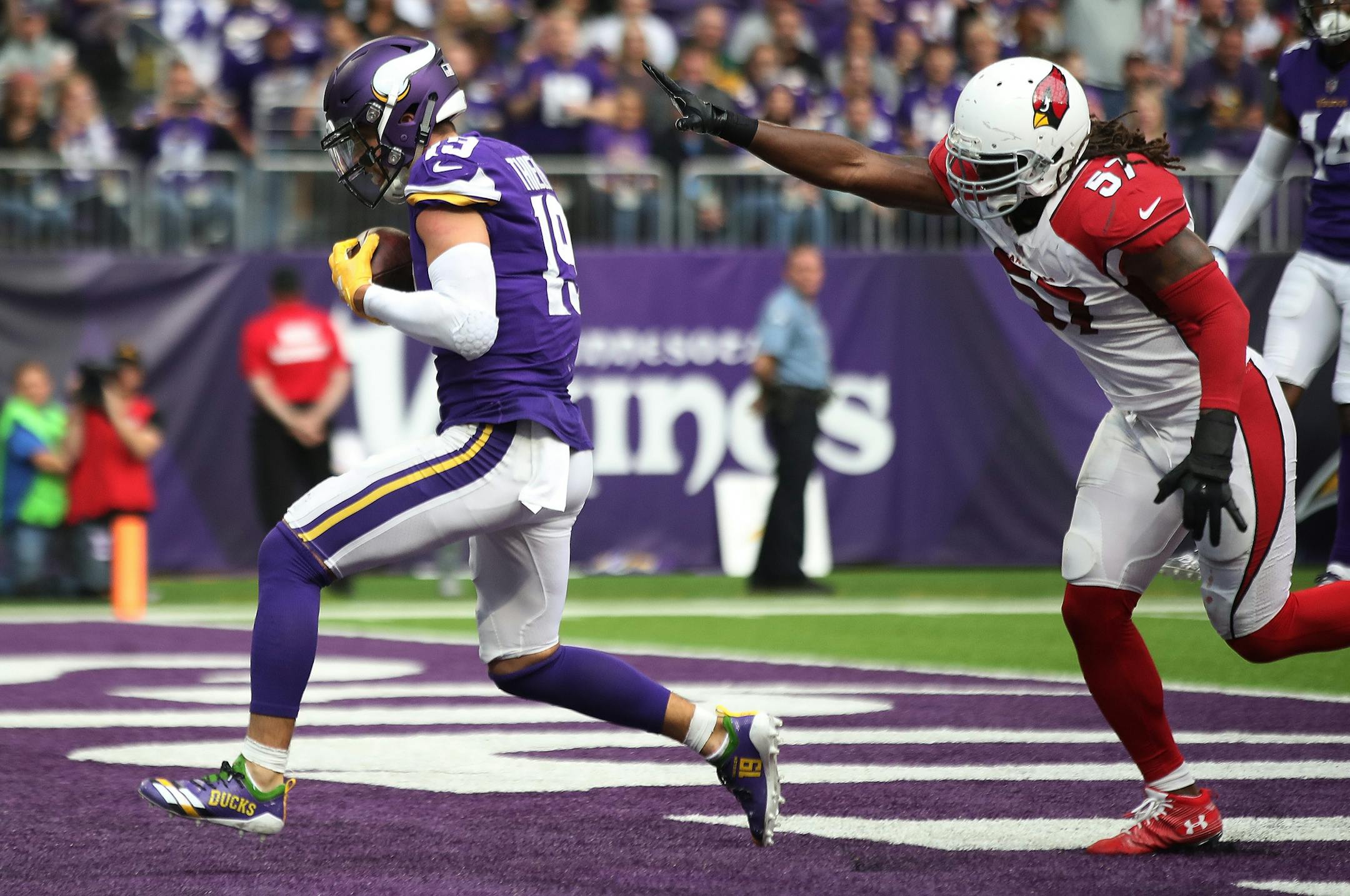 Minnesota Vikings wide receiver Adam Thielen (19) caught a third quarter touchdown over Arizona Cardinals linebacker Josh Bynes (57) at U.S. Bank Stadium Sunday October 14, 2018 in Minneapolis, MN.